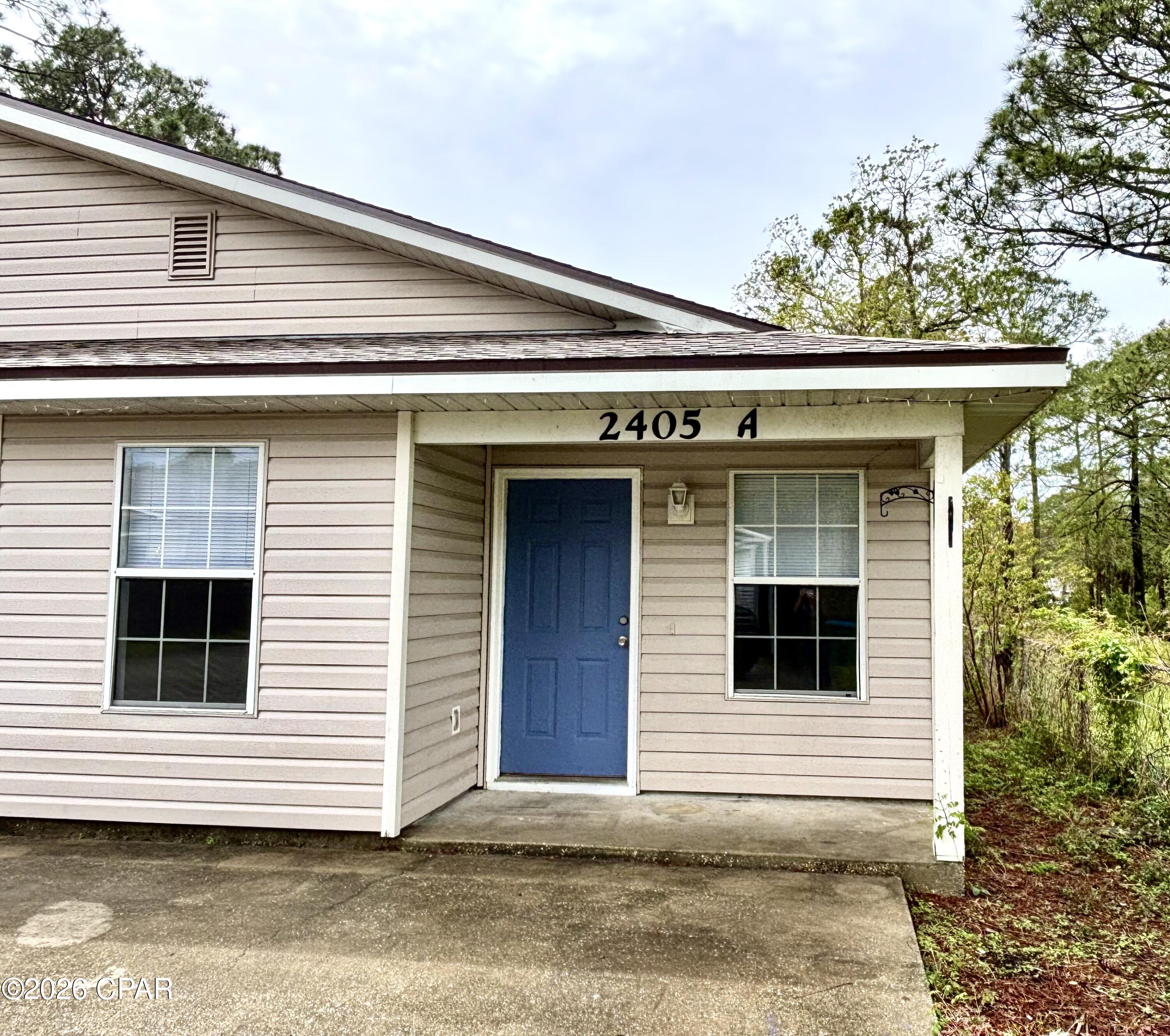 Discover the peace and tranquility that this charming 1 bedroom, 1 bathroom unit has to offer. Set back off the road in a prime eastside Panama City Beach location this unit is just minutes from the beach, Thomas Drive and Front Beach Road. It provides easy access to dining, shopping, and entertainment. This unit features a large open living area with kitchen, one bedroom with a large walk-in closet and one full bath. It also has a private fenced backyard and two dedicated parking spaces, making it a perfect retreat while staying conveniently close to everything.