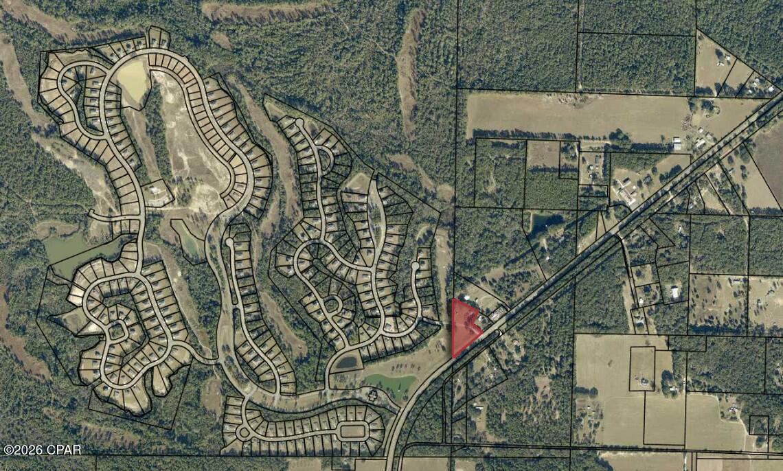 Positioned at the entrance to the Heritage Plantation master-planned community in Laurel Hill, this +/-2.85-acre commercial parcel offers an exceptional opportunity within the rapidly expanding North Crestview market. With approximately 425 feet of direct frontage along Highway 85, the site provides strong visibility, convenient access, and a highly adaptable platform for a variety of development concepts.

Zoned Mixed Use (MU), the property allows flexibility for a broad range of commercial uses, including neighborhood retail, professional office, service-oriented businesses, multifamily, or complementary community amenities. The site is already cleared and grubbed, with power, water, and sewer available, reducing upfront development costs and accelerating timelines for prospective users or investors.

Strategically located adjacent to the entrance of Heritage Plantation, a growing residential community, the property benefits from immediate proximity to an established and expanding customer base. Highway 85 serves as a key connector within North Crestview and surrounding communities, carrying a steady mix of local, commuter, and regional traffic that enhances daily exposure and supports recurring demand for nearby services and retail.

With favorable mixed-use zoning, essential utilities in place, and a prime position along a well-traveled corridor, Heritage Plantation Commercial represents a compelling development opportunity in one of Northwest Florida's most active growth markets.