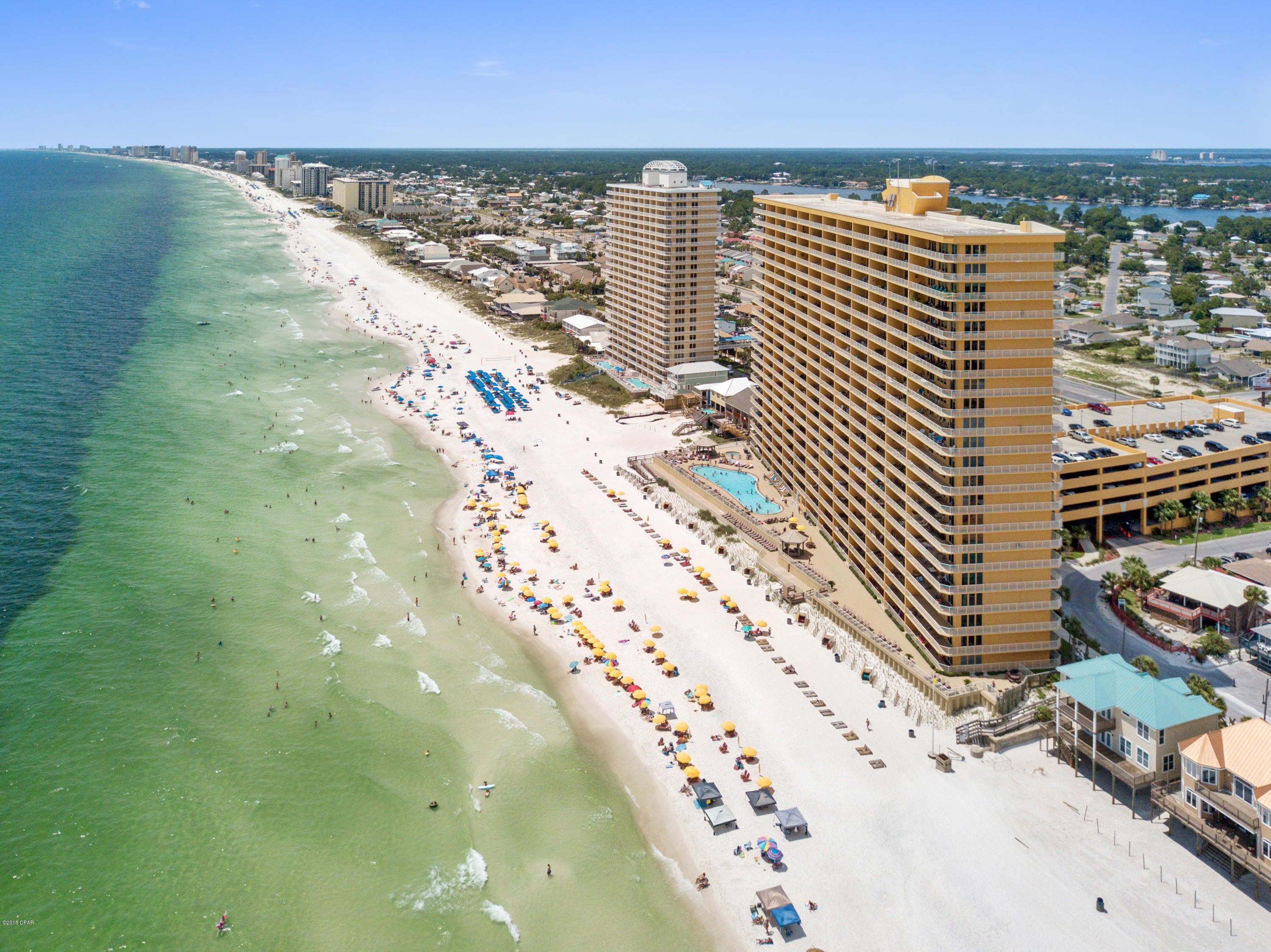 Excellent opportunity to purchase in Treasure Island in Panama City Beach, Florida! Condo 1005 is a perfectly situated 2 bedroom, 2 bathroom, beach front property in one of the area's premier resorts. Boasting nearly ~1,400sf of living space this floor plan offers plenty of room for the whole family to relax and unwind to the sounds of the waves rolling in from the Gulf of Mexico. Endless sunsets present themselves from the 10th floor perch nestled perfectly and sure to appeal to the rental investor or second home owner alike. This property is sold fully furnished and with a well stocked kitchen making this a turn-key rental opportunity that requires very little from a new owner to begin generating revenue. Located near the lagoon this property appeals to the avid boater as well! Enjoy both world's from Treasure Island with all of the modern amenities you've come to expect from one of the areas top vacation rental resorts situated on the east end of Panama City Beach near St. Andrews State Park, Shell Island & Grand Lagoon.