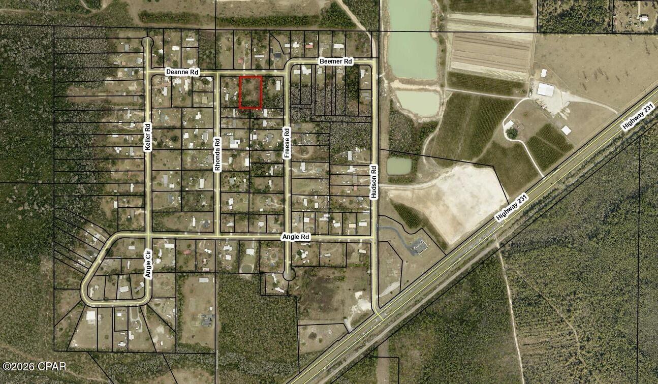 This is a wonderful opportunity to acquire a nice country lot yet just a short drive to all things Bay County!  This lot is right at 1 acre, approximately 170 x 256 with 2 access drives in place.  This parcel previously had a mobile home, maybe 2, so there are power poles in place and a good portion of the property is clear and ready for you to make it your own!
Possible septic and well on property but seller makes no warranty on the condition of them.  Thank you for considering this property.  All measurements and information should be verified by buyer or buyer's agent.