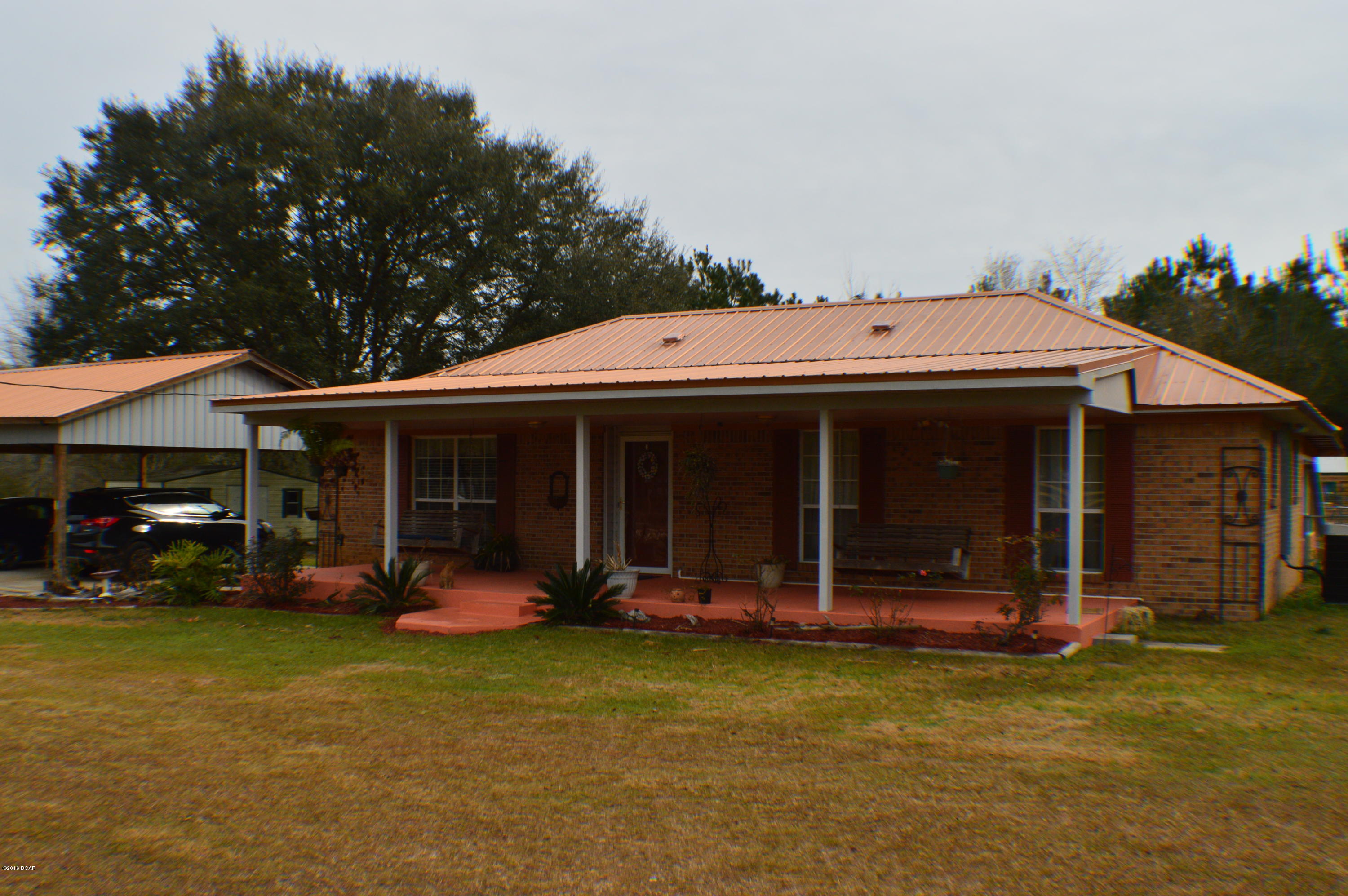 Recently renovated home in the country...paved road!!!! The original home has been added onto to include formal dining, master bed and bath, additional bedroom (currently being used as sewing room, make great office or nursery) In ground pool, large screened porch... 3 car detached carport steps away from home. Lots of outdoor storage with 12x16 shed, an additional 12x20 shed with electricity... Large 24x24 enclosed Man Cave with lean too on 3 sides for all the toys, even comes with wood stove!!! It won't last long!!!!