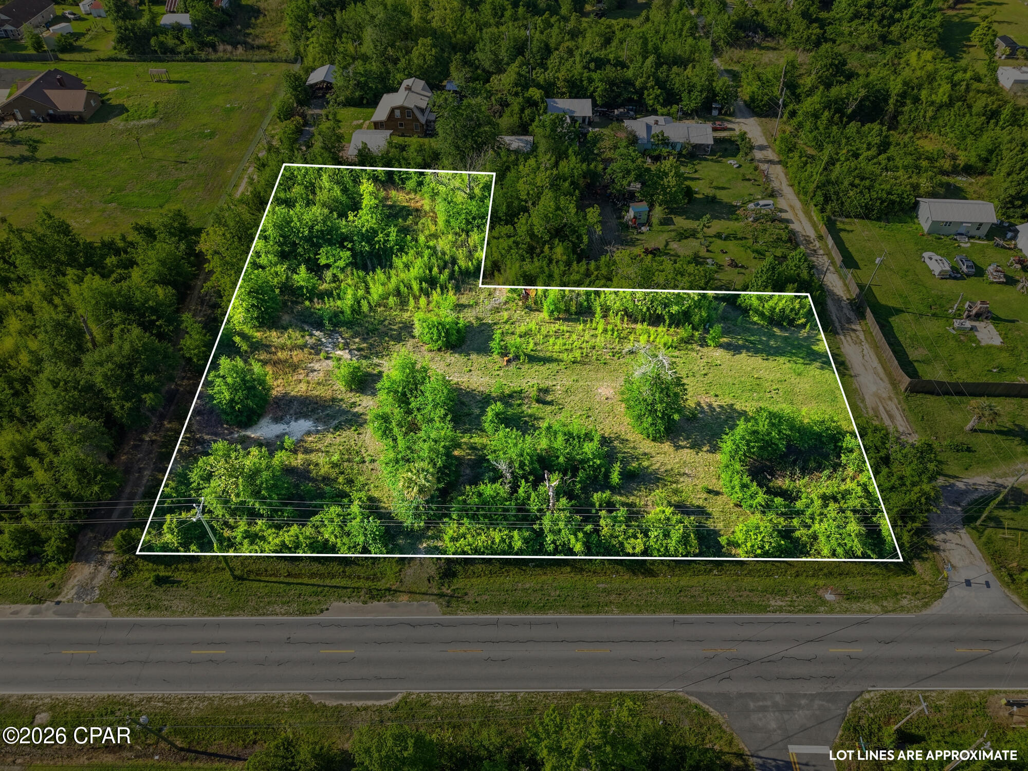 AMAZING PRICE  REDUCTION on this pristine 1.499 acre lot that is loaded with potential! Build your new home and have plenty of room for gardening, live stock, and outdoor activities. You'll have that spacious country living feel but you are just minutes to everything! There is no HOA and the lot is high and dry.  There is beautiful trees, a pond and a blank slate to build your oasis. This beautiful lot can be accessed in multiple locations with 330 feet along John Pitts Road.  The location is just a few miles to Majette Park, HG Harders Recreation Complex and only 4 miles to the new Publix. There was a home on the lot prior to hurricane Micahel with power, well and septic tank but all will need to be assessed by the new buyer. Survey is available. Seller is motivated...make an offer today!