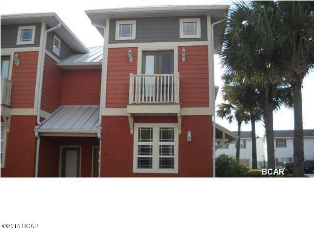 Mediterranean style town home located on the West end of Panama City Beach. Just minutes from Pier Park and a short drive to Walton County. The community features a community pool and trash. The unit features an open living room, dining room, kitchen combo with the master bedroom downstairs, and a half bath off of the living room. The two spare bedrooms are upstairs with a jack and jill bathroom. Community pool