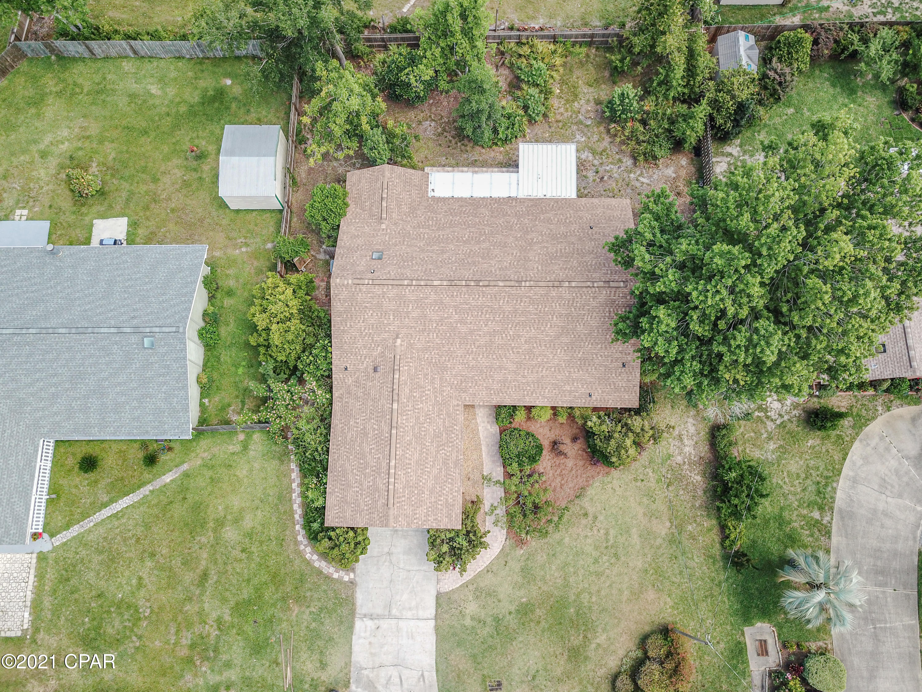 Premier Estates ! NEW ROOF, NEW FLOORS, Quartz Countertops, Florida Room, 4 Bedrooms, 3 Bath, two car garage and lots of outdoor atmosphere with Pecan , Orange and  Tangerine trees with low maintenance landscaping in the fenced back yard. Located right in the heart of Panama City FL and close to shopping, hospitals, and entertainment. This home is move in ready. Many attractions are within 30 min such as Tyndall Air Force Base, Several State Parks, The World's Most Beautiful Beaches Panama City Beach, Famous Pier Park Shopping and some of the best Fishing on the planet. If you enjoy the outdoor life there are many areas to snorkel in the cool water Natural Springs, Beach Jetties, Kayaking, Camping, Paddle boarding Swimming, ect... Call today for your private tour of this beautiful home.