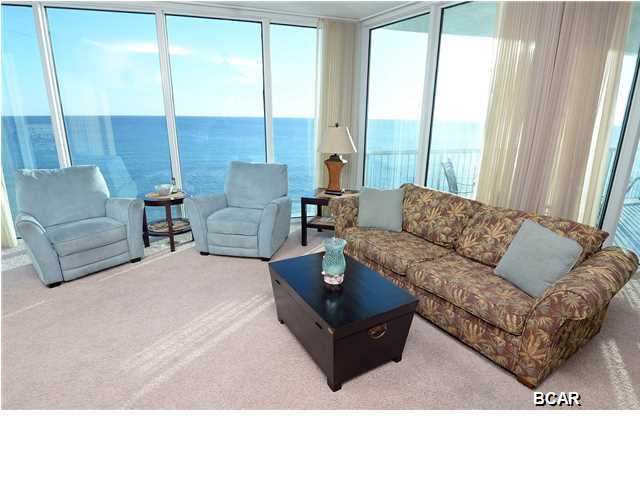Palazzo is an upscale low density condominium, consisting of only 129 gulf-front units with four levels of covered gulf-front parking under the building. So although unit # 401 is located on the 4th floor, it has an approximate 8th floor elevation and subsequently the higher level views! This is a 1849 square foot CORNER UNIT floor plan offering three bedrooms, three full bathrooms, and an oversized balcony for taking in the sweeping vistas and spectacular sunsets. Additional features include crown molding, floor to ceiling glass windows and doors, tile floors in the entry, kitchen, and bathrooms, carpet in the living area and bedrooms, granite kitchen countertops, ample kitchen cabinetry, pantry, owner's closet, and a private storage locker. The unit is being sold fully furnished in