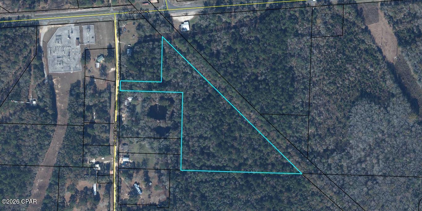 Check out this wooded 9.1 acres, 1.3 miles out of Graceville. There is approximately a 55-foot access to the property on JS Jones Road.  The planning department of Holmes County has reported that much of this land is wetlands.   As it is so close to Holmes Creek, it is also partially in the AE flood zone.  A portion is dry, but the buyer would need to do due diligence in mapping that portion out.  Would make an ideal hunting location.  Survey available.