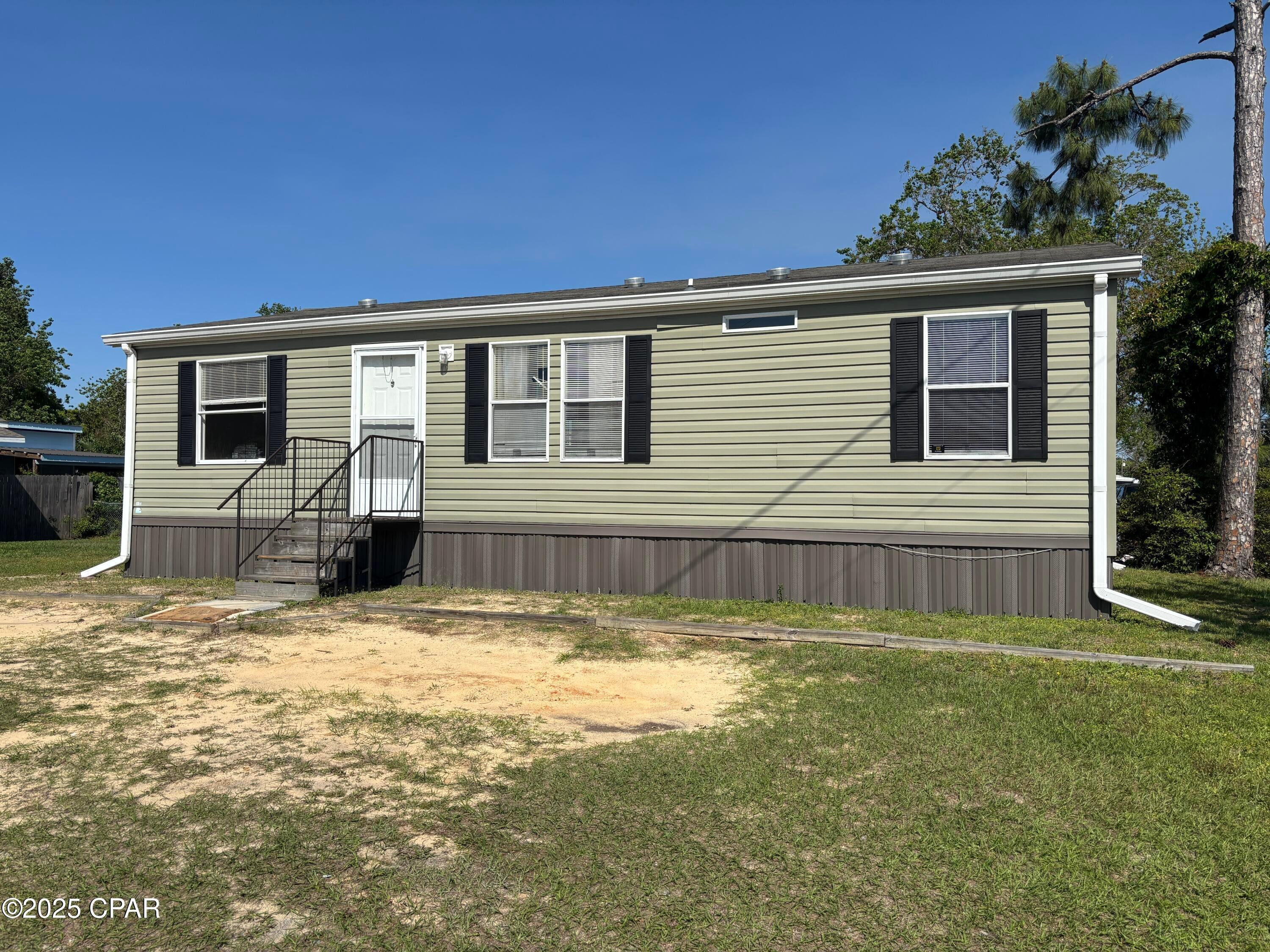$200 OFF 1ST MONTH'S RENT Charming 3 bed 2 bath home located in St Andrews. Convenient to the colleges, and the beach. This late model manufactured home offers a convenient location, located in town and just a short distance from the beach. With yard care included, you can enjoy the yard without the hassle of maintenance. Don't miss out on this opportunity to make 3910 W 25th St your new home sweet home.