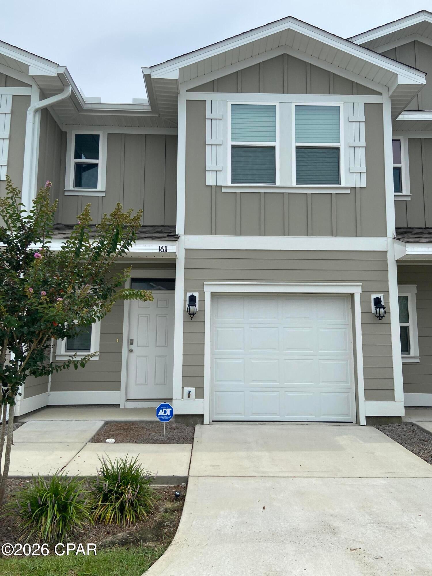 LIKE NEW 3BD 2.5BA TOWNHOUSE W/ GARAGE in the heart of Lynn Haven and near Bay County's most requested charter schools and also near Mosley High School - Come enjoy the maintenance free lifestyle with no yardwork... LVP flooring & carpet, granite counters, stainless appliances, shaker-style custom cabinets, huge pantry, breakfast bar that can seat four, recessed lighting, upgraded ceiling fans & fixtures, lots of closet space! W/D hookup upstairs by your bedrooms! Covered back patio. Landscaping included. Pets negotiable, restrictions & pet fee apply.