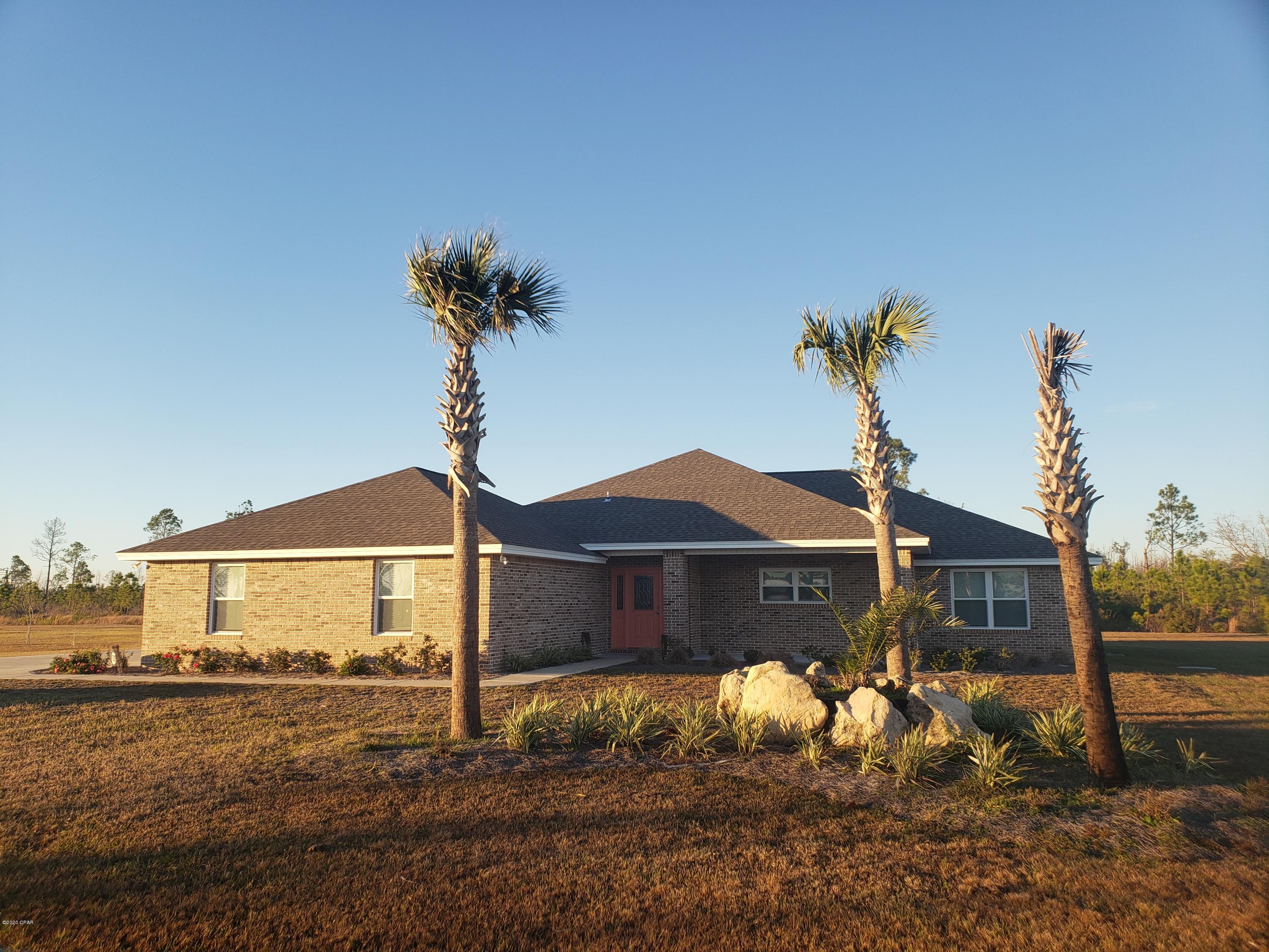 **SPECIAL** $500 OFF FIRST FULL MONTH'S RENT!!



This exceptional 2016 home is located at one of the most desirable FLY-IN communities in the south. Sandy Creek Airpark is located near Panama City Florida and is close to one of the Worlds Most Beautiful Beaches. Inside the home you'll find a spacious great room in the open style plan that flows from the vast kitchen to the huge covered screened porch.The oversize garage also has an EXTRA storage room with built-in shelving.

Air Craft Hanger in INCLUDED!!

The spacious kitchen is detailed in natural maple cabinets and seamless Livingstone solid surface countertops. A large angular island features a rimless undercounter stainless sink and dishwasher. The stainless appliances are Samsung including refrigerator, induction range, microwave/exhaust hood, trash compactor and a Jenn-air indoor grill. To the left of the great room is the large master bedroom which has a beautiful trayed ceiling. Passing twin walk-in closets you find a large master bathroom with full length elevated dual vanities and a makeup counter. On the opposite wall is a large glass enclosed shower and a separate deep garden tub. Beyond the master bath, you have convenient access to the laundry room, the foyer and the garage. The home has engineered wood flooring in the common areas with carpet in the bedrooms and tile in the bathrooms and laundry. Many other upgrades and amenities include an upgraded air conditioning and air cleaner system, a finished oversized garage with overhead storage and a large storage room, a 24KW Generac backup generator. 

Option for Hanger to be included with this home rental. - A 38 ft wide electric door assures easy access to a tall hangar which is perfect for your aircraft, RV, boats or recreational toys. 
If you are looking for a beautiful upscale fly-in community or just a quiet subdivision with lots of space, this is an outstanding property that you need to see.