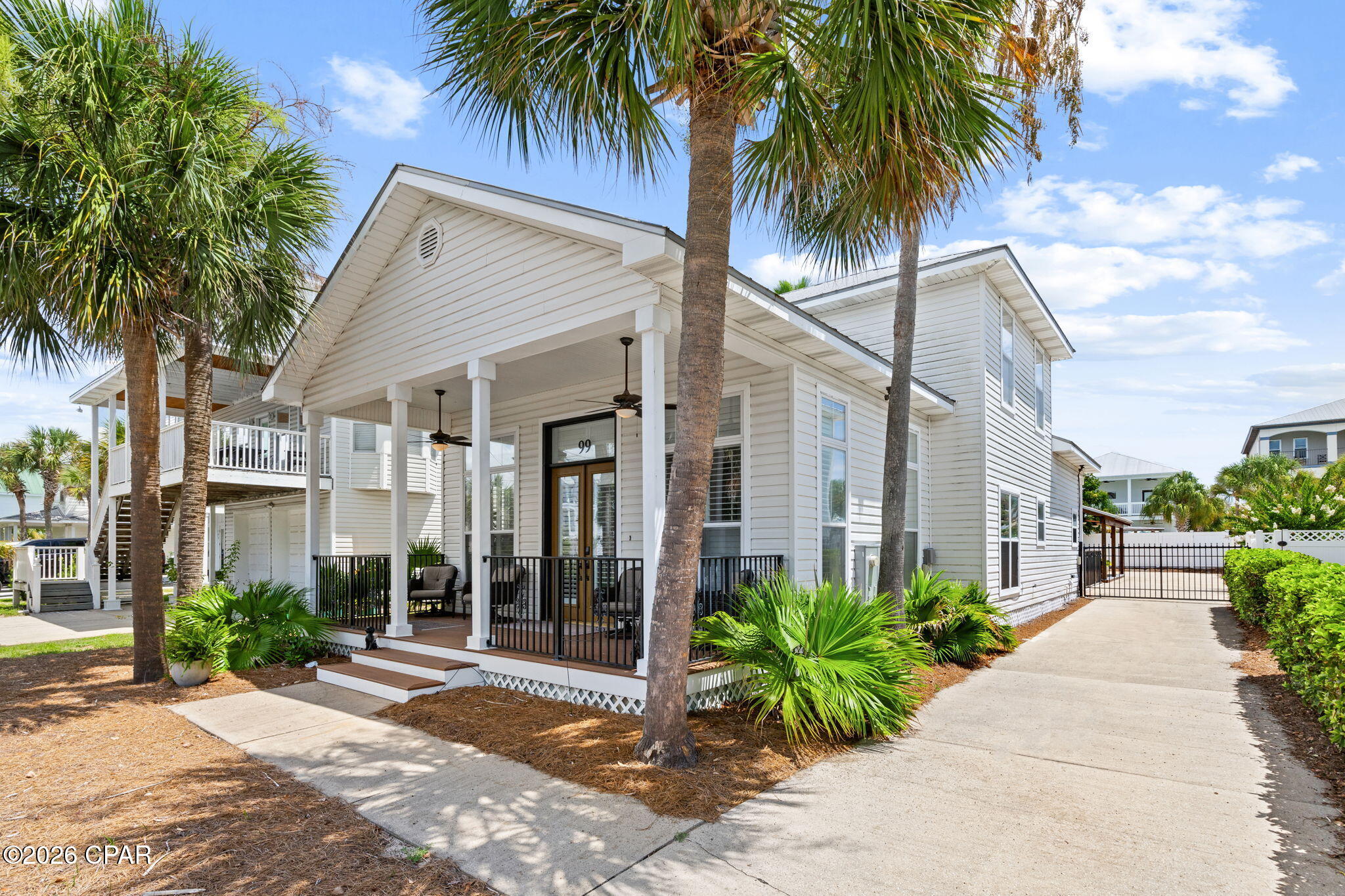 YES!  You CAN have it all!  A main living space with 3 BR and 2.5 BA, a private heated pool, AND space for guests or friends in the self-contained cottage out back--all within an easy walk to the white sandy beaches!

PROPERTY HIGHLIGHTS INCLUDE:
--Fully furnished and ready to rent or enjoy
--High ceilings and lots of natural light
--Open floor plan for kitchen/dining/living space
--Double vanities, jetted tub and separate shower in downstairs master suite
--Large pantry/utility room (8.11 x 13.5)
--Dining seating for 6 + 4 at bar
--Gas fireplace
--Plantation shutters
--TWO full kitchens (main house and guest house)
--TWO washer/dryer areas (main house and guest house)
--Curated artwork and decor
--Close to terrific shopping and dining options
--Flood Zone X!  No flood insurance required!

Come see this beautiful home today!