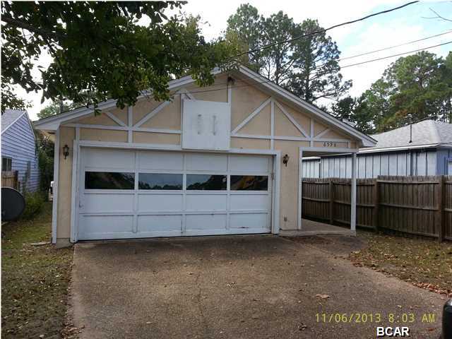 FANNIE MAE HOMEPATH property!!! INVITING AND QUAINT! Convenient location to Tyndall AFB, schools, shopping and more! This is a charming 3 bedroom 2 bath home Two of the three bedrooms have sliding glass doors to a wonderful screened enclosure that opens to the back yard. The entire back yard lends itself to that ''Secret Garden'' feel for the aspiring gardener with endless possibilities. Two-car garage with pull-down stairs to the attic access make storage a breeze and there is also plenty of indoor closet space. Floor to ceiling fireplace in the living room provides a warm welcome to guests and the open dining area makes visiting easy. Great Florida living here! All sizes and dimensions are approximate -- please verify if important.