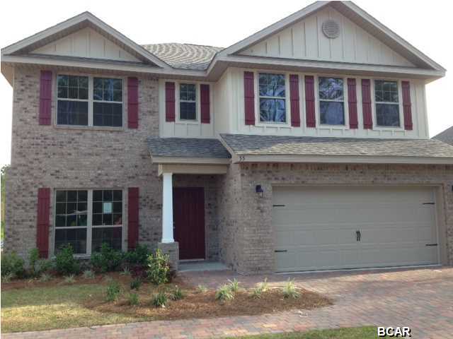 The Julian plan is a spacious two story home with the master on the first level, while the rest of family hangs out upstairs! This home offers you 4 Bedrooms and 3 1/2 baths! The large bonus room upstairs in the perfect media room or play room. Plus this new and upcoming community is close to everything in Lynn Haven. And what home would be complete without a large covered back patio. One of the upstairs bedrooms could be used as an upstairs master giving you two master if needed. Photo is not actual home.