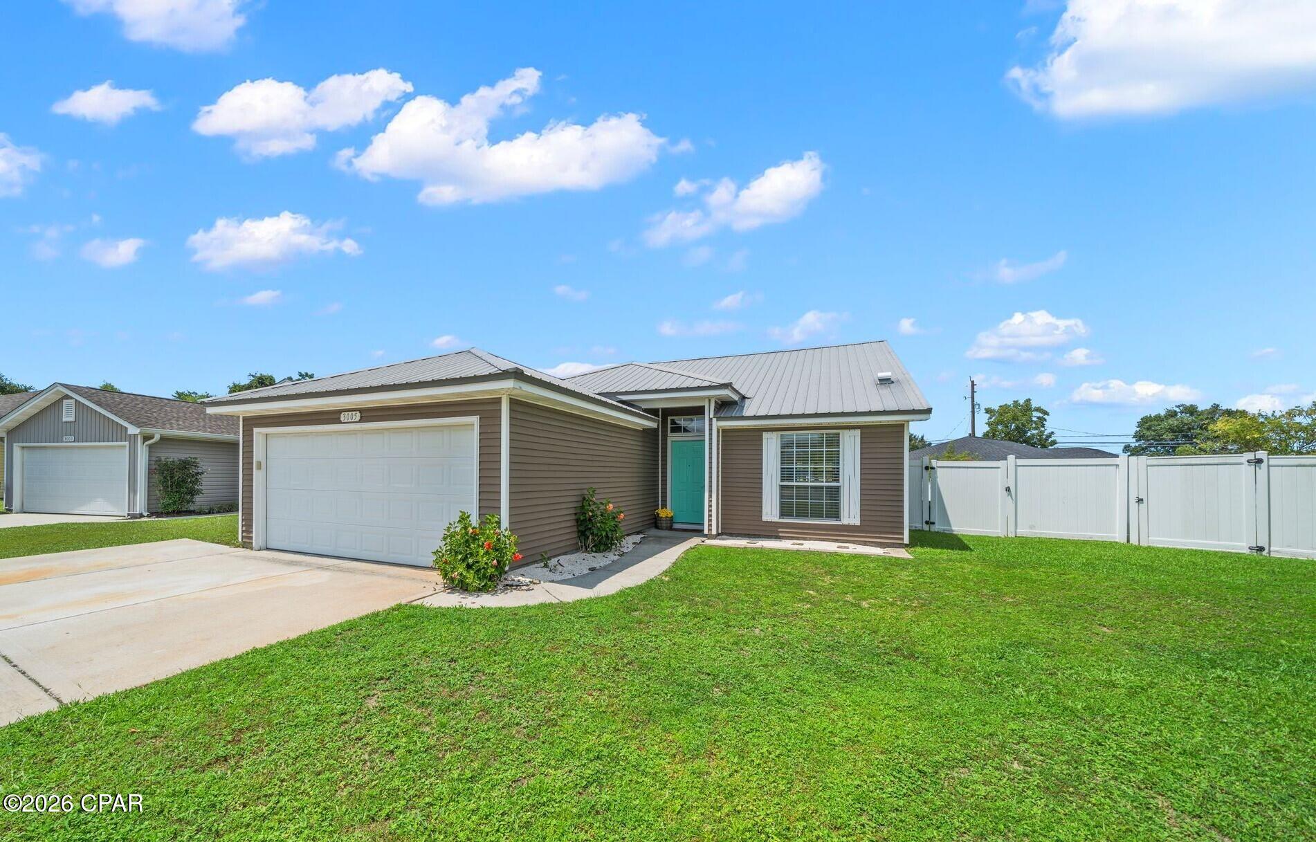 CURRENTLY UNDER CONTRACT; SELLER MAY ACCEPT BACKUP OFFERTS. Finding the perfect place to call Home doesn't have to be difficult! This 3 bedroom/2 bath home on a quiet cul-de-sac is the proof! A spacious and bright kitchen leads to an open concept floor plan with a vaulted ceiling. The primary bedroom is just off of the living area and has an en suite with a standup shower. The two additional bedrooms share a central hall bath with a tub/shower combo. The attached two car garage is connected by the laundry room. A spacious porch for grilling and a fully fenced back yard will make a great end of day reflection spot. This home had a new roof in 2019 and new siding in 2021 and is centrally located close to shopping, schools, restaurants and more. Come see why this just may be the perfect place to call Home!