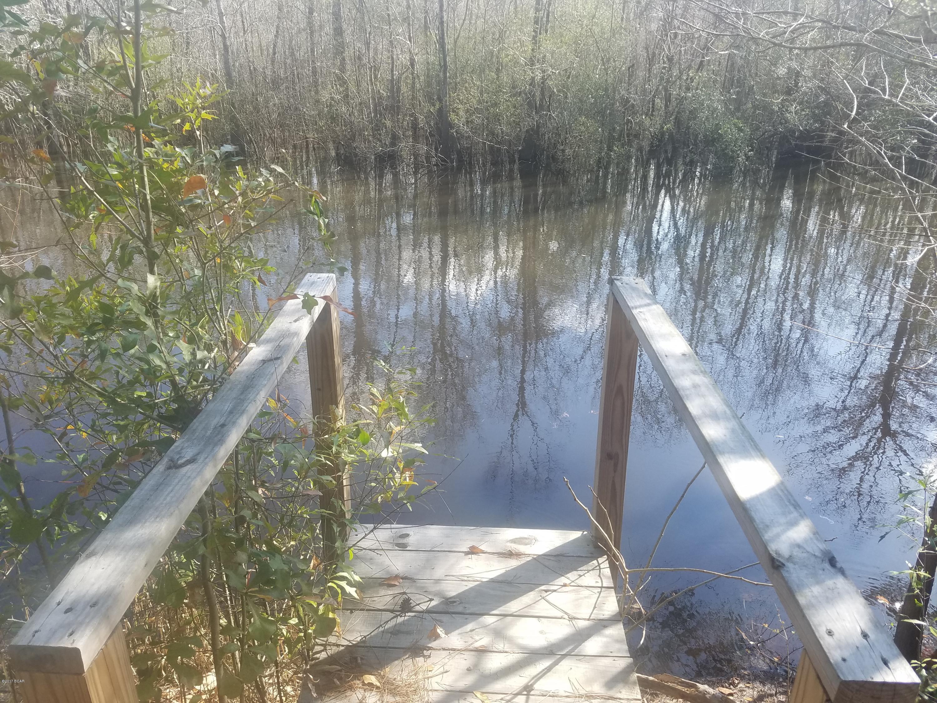 Beautiful Waterfront lot at Steele Field Fish Camp. Property already has a well, septic, and power pole. Priced to sell.