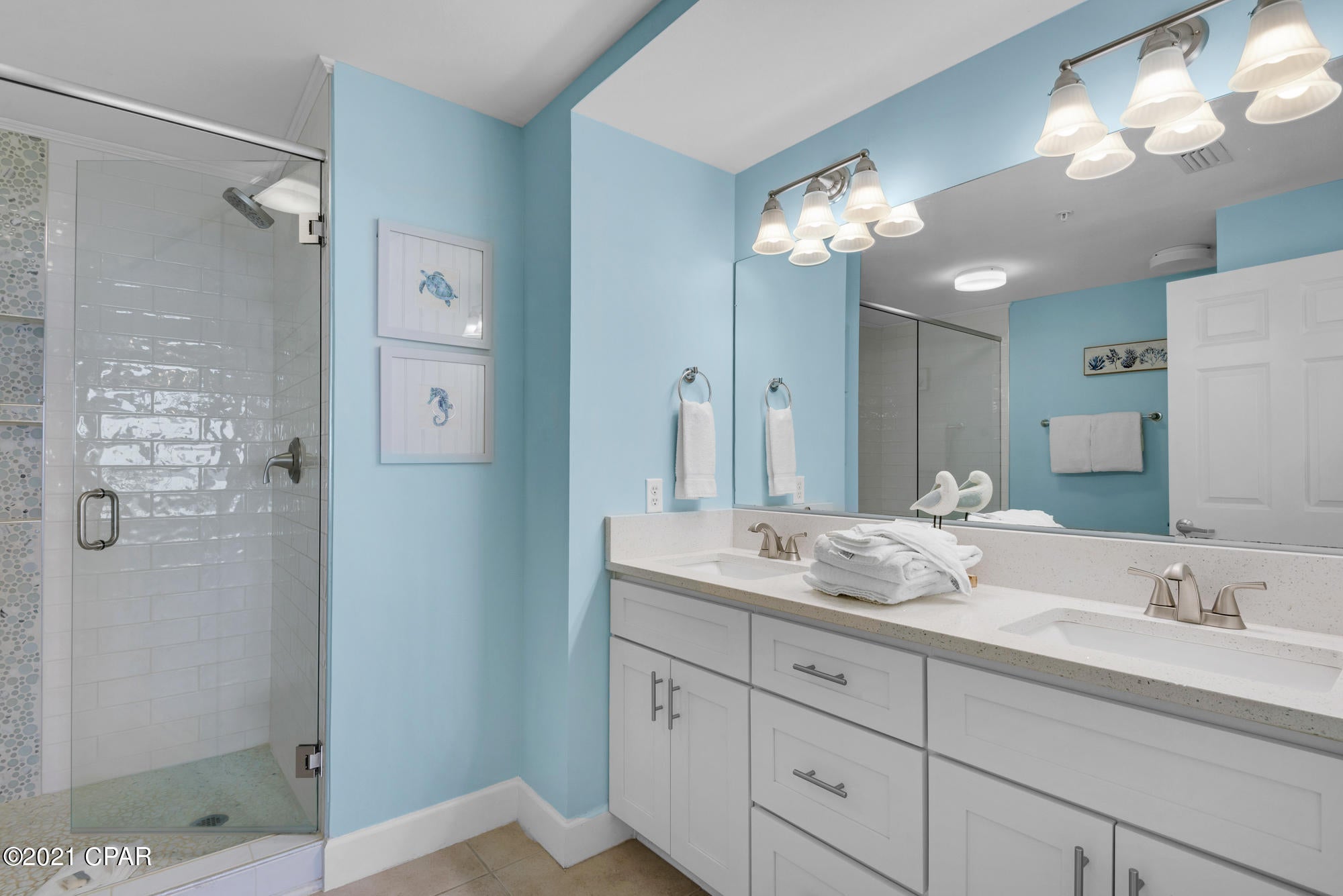 2020 TOTAL CONDO RENOVATION!  Last and Final Offers Accepted till noon 5/25/2021. This is a spectacular 2BR+Bunk Room at Sunrise Beach, one of the most sought after resorts in PCB. The upgrades start with the kitchen and baths with all new cabinets, faucets, sinks, and quartz countertops. New glass and tiled master walk-in shower. All new Samsung stainless appliances. Sunbrella fabric living room furniture and Polywood balcony furniture. HVAC is new and water heater only 3 years  old.  Sleeps 9 with king master, queen guest, bunkroom with twin over full, and queen sofa bed. This is one of the few resorts that has under resort garage parking for all units. It also has some of the lowest HOA fees on the beach and is a top rental resort (condo already has over $42,000 on the books for 2021). It is only 1 mile east of Pier Park and within walking distance of Sharky's and Runaway Island restaurants plus Gulf World. It is also one of the closest resorts to the Frank Brown Recreation Park, where many of the ball tournaments and special PCB events are staged.
Check out the Sunrise HOA budget and capital reserves and you'll see this resort is one of the best managed resorts on the beach (no HOA increases in 3 years and the entire building has been re-painted, and walkways + pool area have been totally resurfaced).  Sunrise is also owner controlled, which means the homeowners own the gym, the pools, and receive income from their beach chair rental. NOTE: ALL INFORMATION AND MEASUREMENTS ARE DEEMED RELIABLE HOWEVER NOT GUARANTEED. BUYER SHOULD CONFIRM ALL INFORMATION.