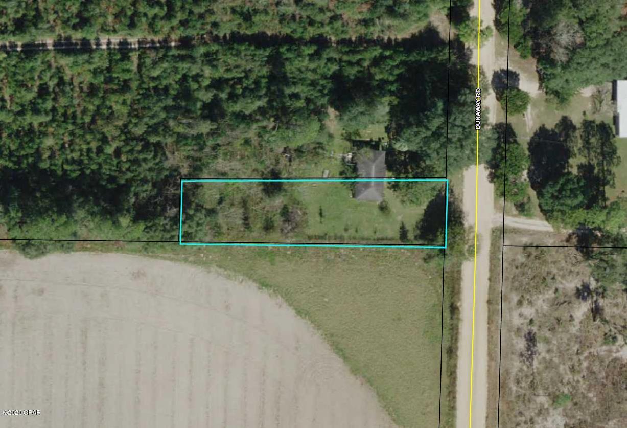 This lot has great potential.  There is an existing monolithic concrete slab that could serve as a stating point for a new home or a landing pad for a home to be moved in.  Lot also features an existing well and septic tank that were functioning at time home was lost in fire.  This is a great find!  Call today to schedule your showing.