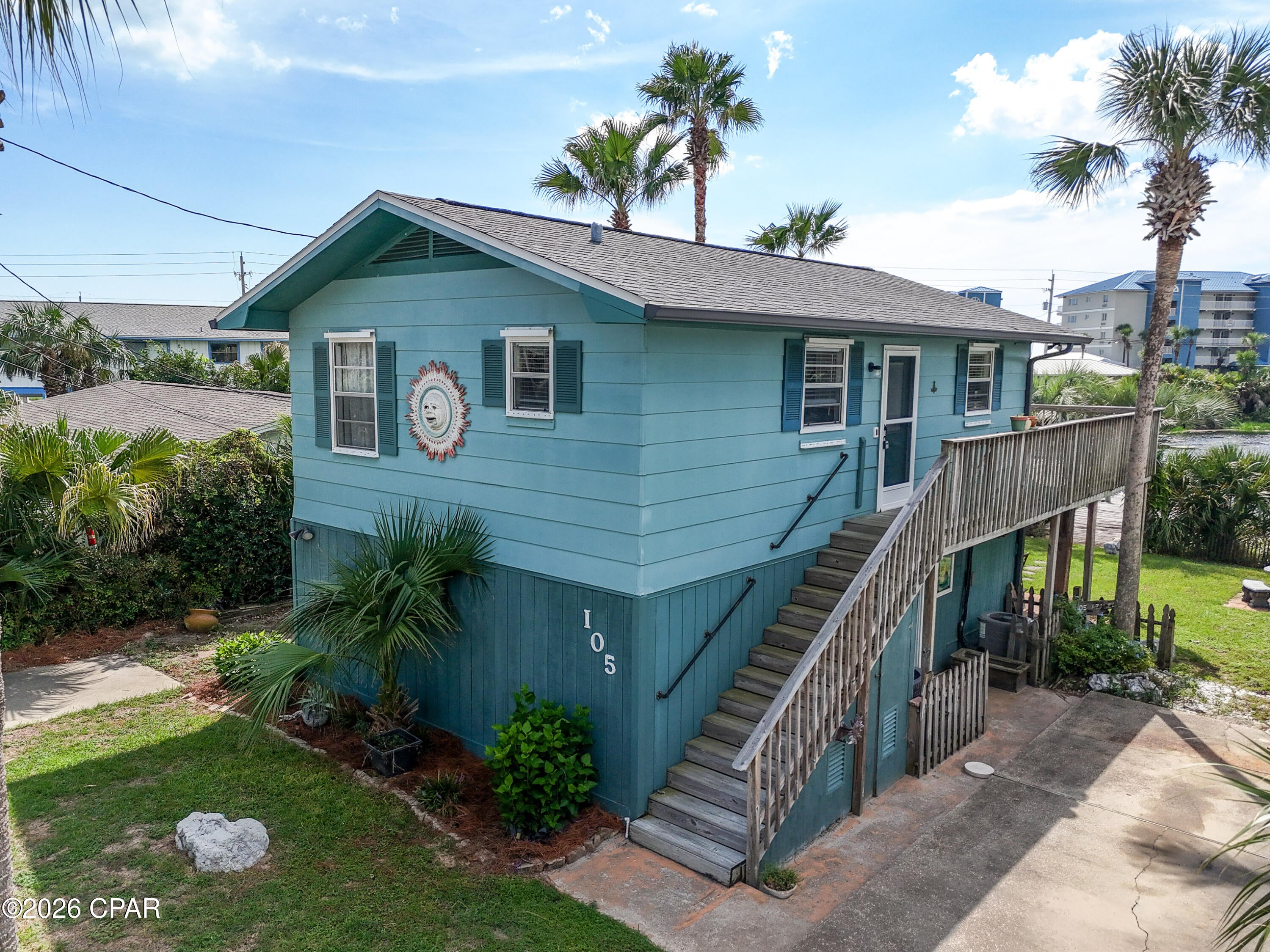 LOCATION, LOCATION, LOCATION! Here's your chance to own a waterfront property on beautiful West Twin Lake, just one block from the Gulf of Mexico! This 3-bedroom, 2-bath home offers tons of potential for a primary residence, beach getaway, or investment property.

Enjoy waterfront living with your own dock on West Twin Lake--perfect for fishing, kayaking, paddleboarding, or simply relaxing by the water. And when you're ready for the beach, the sugar-white sands and emerald waters of the Gulf are just a short stroll away!

The home could use a little love and updating, but that means the next owner has the opportunity to make it their own and add value. With a little vision, this property could become an adorable coastal retreat.

Even better, short-term rentals are allowed, creating an exciting opportunity for buyers looking for a vacation rental or income-producing property. With lakefront living, Gulf proximity, a private dock, 3 bedrooms, 2 baths, and rental potential, properties with this combination don't come along every day.

Bring your ideas and make this West Twin Lake property your own piece of paradise!