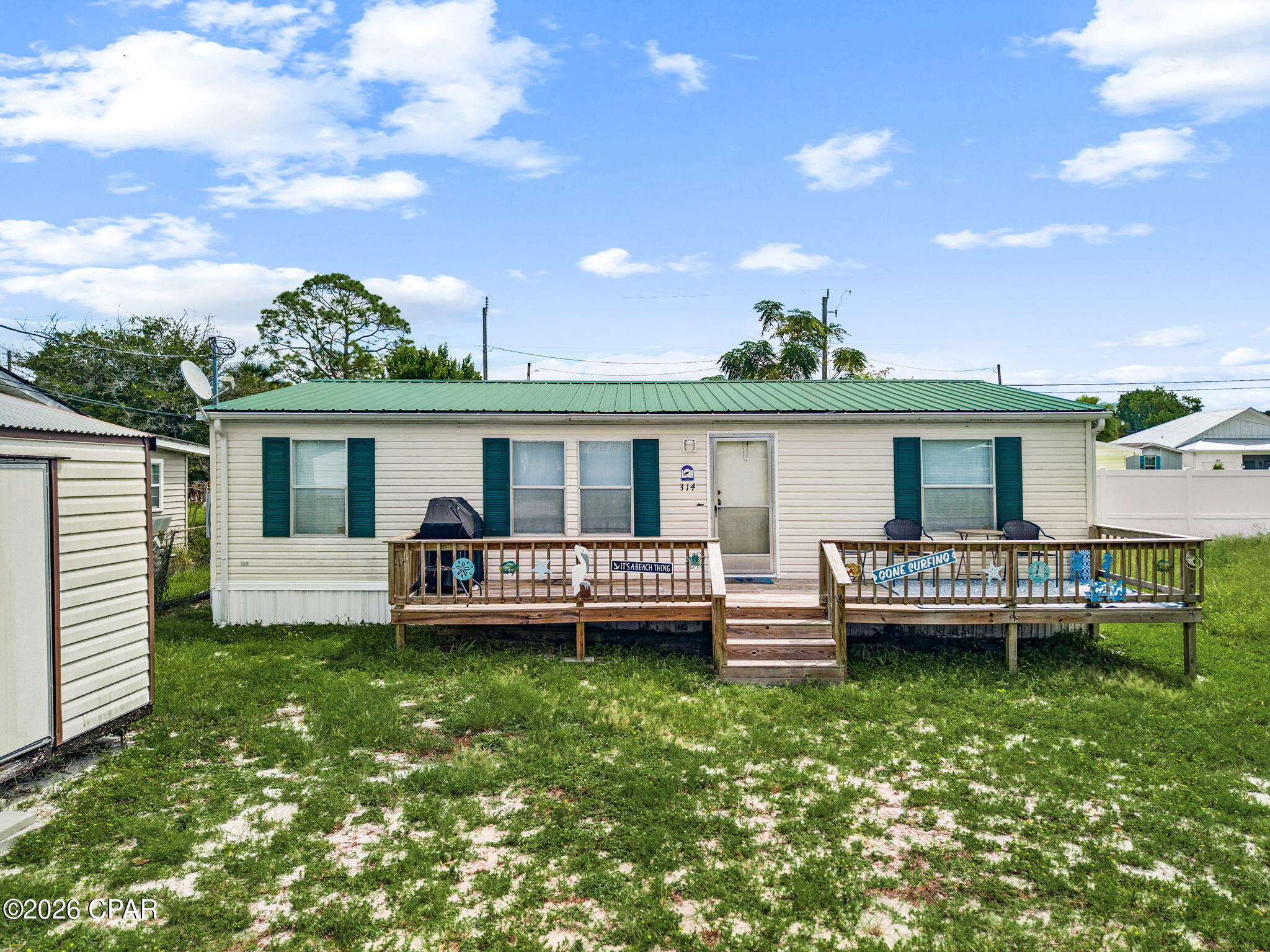 GULF VIEWS, COASTAL LIVING & INVESTMENT POTENTIAL! Just THREE BLOCKS from the stunning Gulf waters of Laguna Beach, 314 El Reposo Place puts you right in the heart of the Panama City Beach lifestyle! Better yet, you can see the beautiful Gulf waters as you pull into the driveway. This meticulously maintained, fully furnished 3-bedroom, 2-bath home offers incredible potential as a primary residence, vacation getaway, or short-term rental investment.

Inside, you'll find 1,080 square feet of comfortable coastal living with two large bathrooms, including a spacious primary bath with a built-in makeup vanity. The home is being sold fully furnished and is thoughtfully equipped for guests, featuring a sleeper sofa in the living room and an additional rollaway bed beyond the three bedrooms.

Major updates mean you can enjoy the beach lifestyle with added peace of mind, including a new HVAC system, new hot water heater, and a roof installed in 2024. The home has been immaculately cared for and is truly ready for its next owners.

The location is the star of the show! Just three blocks to the Gulf and Laguna Beach, with Panama City Beach's beautiful beaches, restaurants, shopping, entertainment, and attractions all nearby. With short-term rentals permitted, this property presents an exciting opportunity in one of the area's most desirable coastal destinations.

Whether you're looking for your own slice of paradise, a vacation home, or a property with rental potential, this one checks the boxes. Coastal properties this close to the Gulf don't come along every day--schedule your private showing today and make 314 El Reposo Place your next piece of paradise! Sellers open to 1,000 towards concessions for new flooring. New photos coming soon
