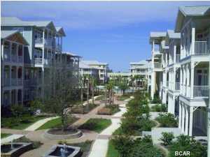 Experience an oasis at the beach. This is a 1 bedroom 1 bath with a study/bunk room, 1069 sq. ft. condo in the beautiful and tranquil gated community of Island Reserve, located off Front Beach Road in Panama City Beach. This open floorplan features hardwood flooring in the main living area, tile in the baths and kitchen, and plush padded carpeting in the bedroom, all with 10' ceilings. The well appointed kitchen includes granite countertops, stainless appliances, and detailed cabinetry. Bonus amenities include washer and dryer, window coverings, garden tub, private patio and covered garage parking and entry. The Island Reserve community features gorgeous ponds, fountains, waterfalls. Club house boasts fitness center, media center, indoor basketball court, aerobic center, game room