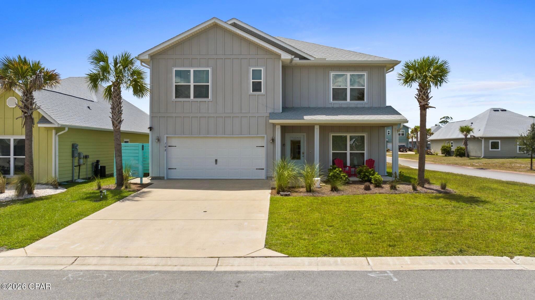 GATHER RELAX EXPLORE!! Spacious coastal retreat designed for making memories. Discover the perfect blend of comfort, style & coastal charm in this beautifully appointed 5-bedroom, 3-bath home featuring two additional bonus rooms with queen sleeper sofas, offering exceptional space for family reunions, multi-generational vacations & unforgettable beach getaways. Professionally designed with a relaxed coastal aesthetic, every room has been thoughtfully curated to create a warm, inviting atmosphere where family & friends can gather, reconnect & make lasting memories along Florida's beautiful Forgotten Coast. Sten into a welcoming foyer that opens to a comfortable secondary living area complete with seating & a queen sleeper sofa. The spacious open-concept floor plan is ideal for entertaining with a fully equipped kitchen featuring everything needed for preparing family meals, a large island with seating for four, an oversized dining area for eight & a beautifully furnished living room where everyone can relax together around the Smart TV. A first-floor king bedroom & full bath provide convenient accommodations for guests, while the converted garage game room offers endless entertainment with two arcade machines, shuffleboard, air hockey & a poker table.Upstairs, the luxurious primary suite features a king bed, private bath & dedicated workspace. Two additional king bedrooms, two bunk rooms with full-over-full bunks, another bonus sleeping area with a queen sleeper sofa & a shared bath with double vanities comfortably accommodate large families & groups. Located in the desirable WindMark North community, this home is just a 6-8 minute walk to the sugar-white beaches of the Gulf where calm waters invite swimming, paddleboarding, shelling & long sunset strolls. Windmark has two resort-style community pools, including North WindMark pool, only a 2-minute walk from the home. A convenient pavilion with restrooms sits poolside, while a boardwalk leads directly from the pool to the beach access, making every beach day effortless. The community also features a modern fitness center, over two miles of scenic nature trails for walking, running & biking, beautiful boardwalks, green spaces & pedestrian-friendly pathways including Beach Walk Road, reserved for walkers, bicyclists & golf carts, creating a peaceful atmosphere throughout the neighborhood. Beyond the community, enjoy the best of Port St. Joe with nearby boutique shopping, casual waterfront dining, fine restaurants, local breweries & coastal attractions. Favorites including Indian Pass Raw Bar, Toucan's, St. Joseph Peninsula State Park & the Cape San Blas Lighthouse are all just a short drive away, while world-class fishing, kayaking, boating & endless outdoor adventures await along Florida's spectacular Forgotten Coast. Call for your private tour & LIVE THE BEACH LIFE!