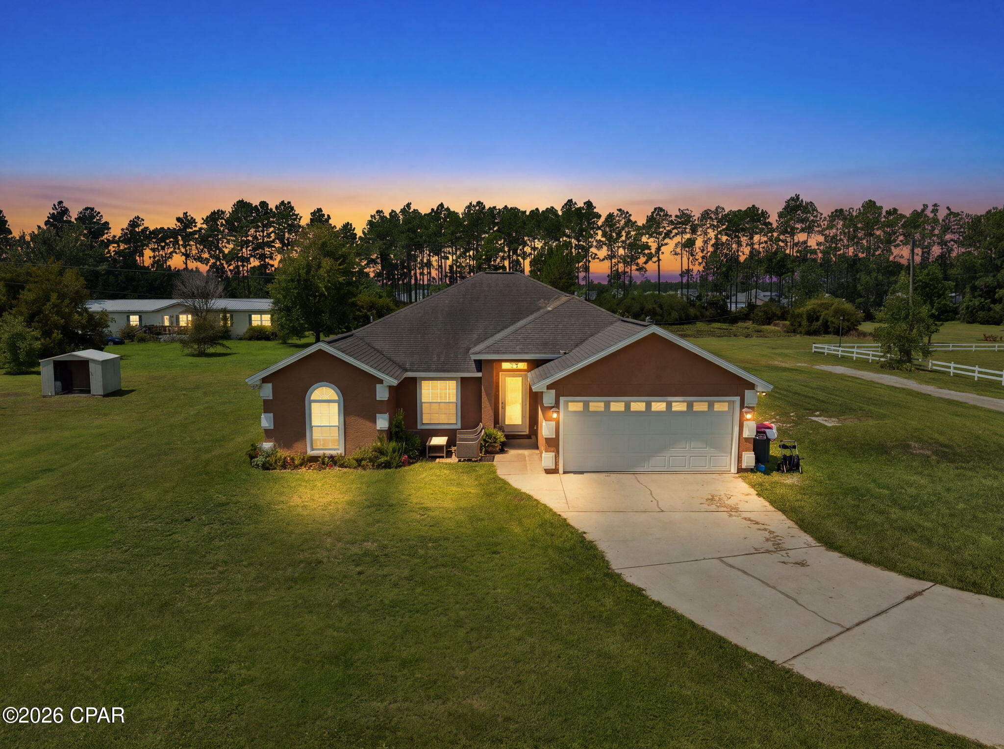 Set on approximately 11 acres, this 4-bedroom, 2-bath home offers the kind of space that can be hard to find without feeling completely removed from everything. Open fields, fenced and cross-fenced pastures, a pond, mature trees, and wooded areas create a setting that feels private and peaceful, while neighbors are still close enough to maintain a sense of community. The property is already set up for horses and cattle, with a barn featuring stalls, air conditioning room for horse equipment, a new horse stall with special flooring, additional storage, and a large covered area with plenty of room for RVs, farm equipment, and everything that tends to come along with having acreage. New horse-appropriate grass planted in the fenced fields. The current tenant is using home as a horse ranch.

Inside, the 1,690 SF home feels bright, comfortable, and connected to its surroundings. New flooring, new front and back doors. New The kitchen features new appliances, granite countertops, abundant cabinetry, and a breakfast bar opening toward the living area, while a separate dining space is surrounded by windows looking out across the property. The primary bath includes new double vanity, tiled walk-in shower, generous storage, and a large garden tub for relaxing.

But some of the best living happens just outside the back door. The oversized screened patio with new screens looks across the open fields, with room to gather, have dinner, stretch out in a hammock, or simply sit for a while as the sun goes down. With 11 acres to roam, room for animals and equipment, and a home that feels comfortable at the end of the day, this is a property designed to be lived on, not just lived in.

All information is deemed reliable and provided for informational purposes; buyers are encouraged to independently verify all details.
