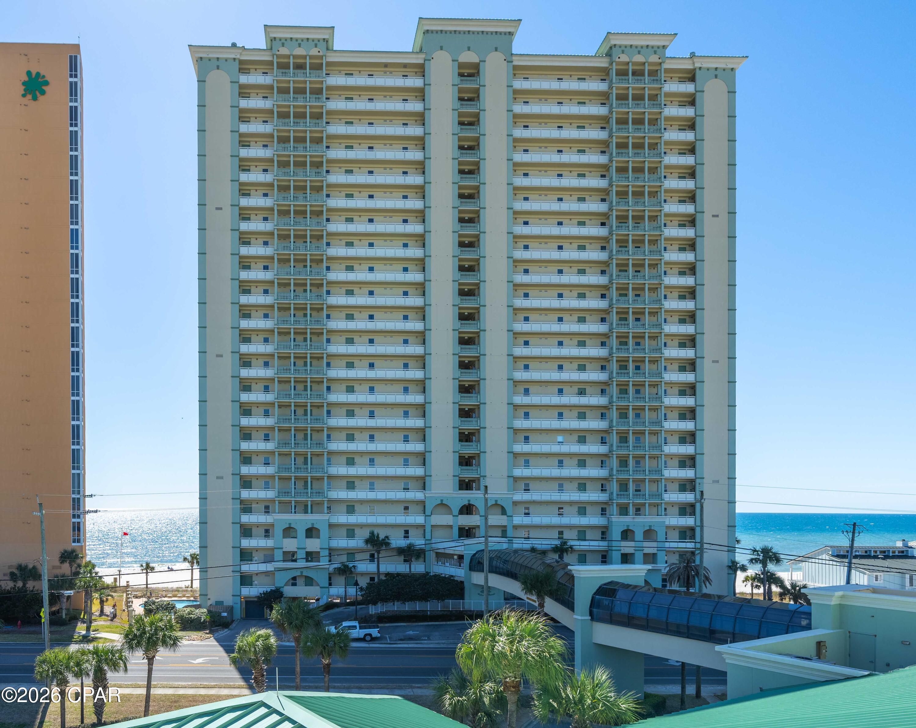 Welcome to Celadon!  A beautiful and amenity filled condominium resort that marries all the conveniences of home with the luxury of a dream beach getaway, all on the quiet west end!  This unit offers amazing, unobstructed views up and down Panama City Beach from its large, 19th floor, 130 sq ft balcony.  The primary bedroom overlooks the gulf waters with a dedicated ensuite and walk in closet.  There is a spacious bedroom with access to the hallway bathroom, as well as a large bunk room for additional sleeping or a game room.  The kitchen features full size appliances, breakfast bar and a pantry for extra storage space.  This unit has been tastefully decorated with beautiful furnishings that will convey with the property.  Meticulous care has been taken to ensure this property is maintained in the utmost optimal condition, including annual servicing to the AC system by a professionally licensed HVAC company.  The HVAC was replaced in July 2016, the water heater was replaced in Nov. 2016,  the washing machine was replaced in Jan. 2022, and the refrigerator and dishwasher were replaced in Sept. 2023.  Celadon is a unique beachfront resort with 2 pools, 1 is an outdoor heated beachside pool w/ spa and the other is an indoor/outdoor, pool on the north side of the road.  There is an enclosed, climate controlled walkover from the parking garage to the resort, so no walking through traffic in the blazing heat!  You will also enjoy the outdoor grills, modern high speed elevators, fitness room, community room, tennis/pickleball courts, and meeting rooms all steps from the beautiful bright sands and clear crystal waters of the unmatched Panama City Beach!!  Celadon has also already completed the required SIRS Inspections and there were no issues found!  Rather you are looking for an investment property or you own beach oasis to get away too, check out this fabulous 2 bedroom with bunk unit in one of the most sought after complexes on the Gulf Coast!