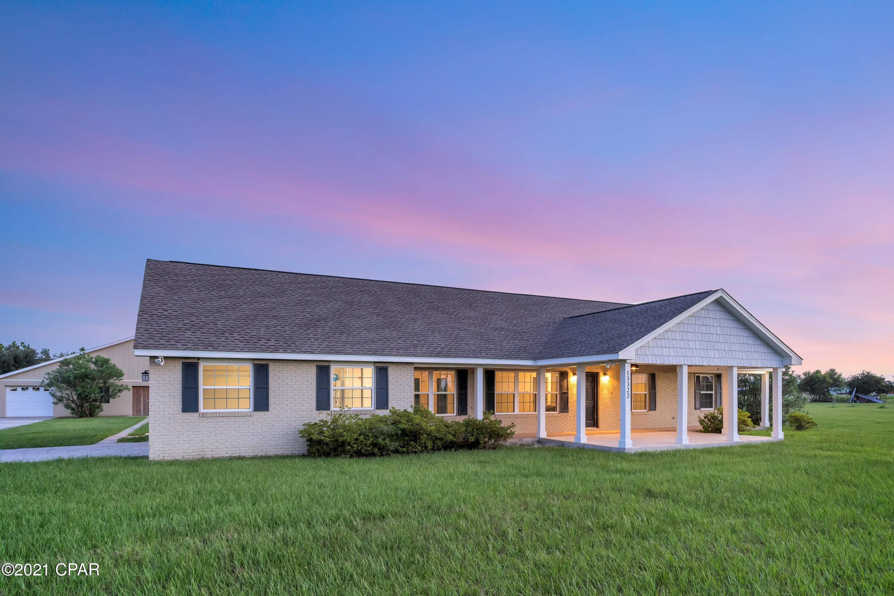 This renovated 3 bedroom 2.5 bath home is located in the exclusive Sandy Creek Airpark - One of the best sunset flying you will experience over the beautiful white sanded beaches of Panama City Beach - This property features a private 3400 foot paved runway, runway facing lot, a 2-car garage, large hangar w/ hydraulic door, community is gated and close proximity to shopping, dining & Tyndall Air Force Base - Home has been fully renovated including new roof, new a/c, new water heater, new kitchen & bathrooms, new flooring, etc - Schedule your showing today!
