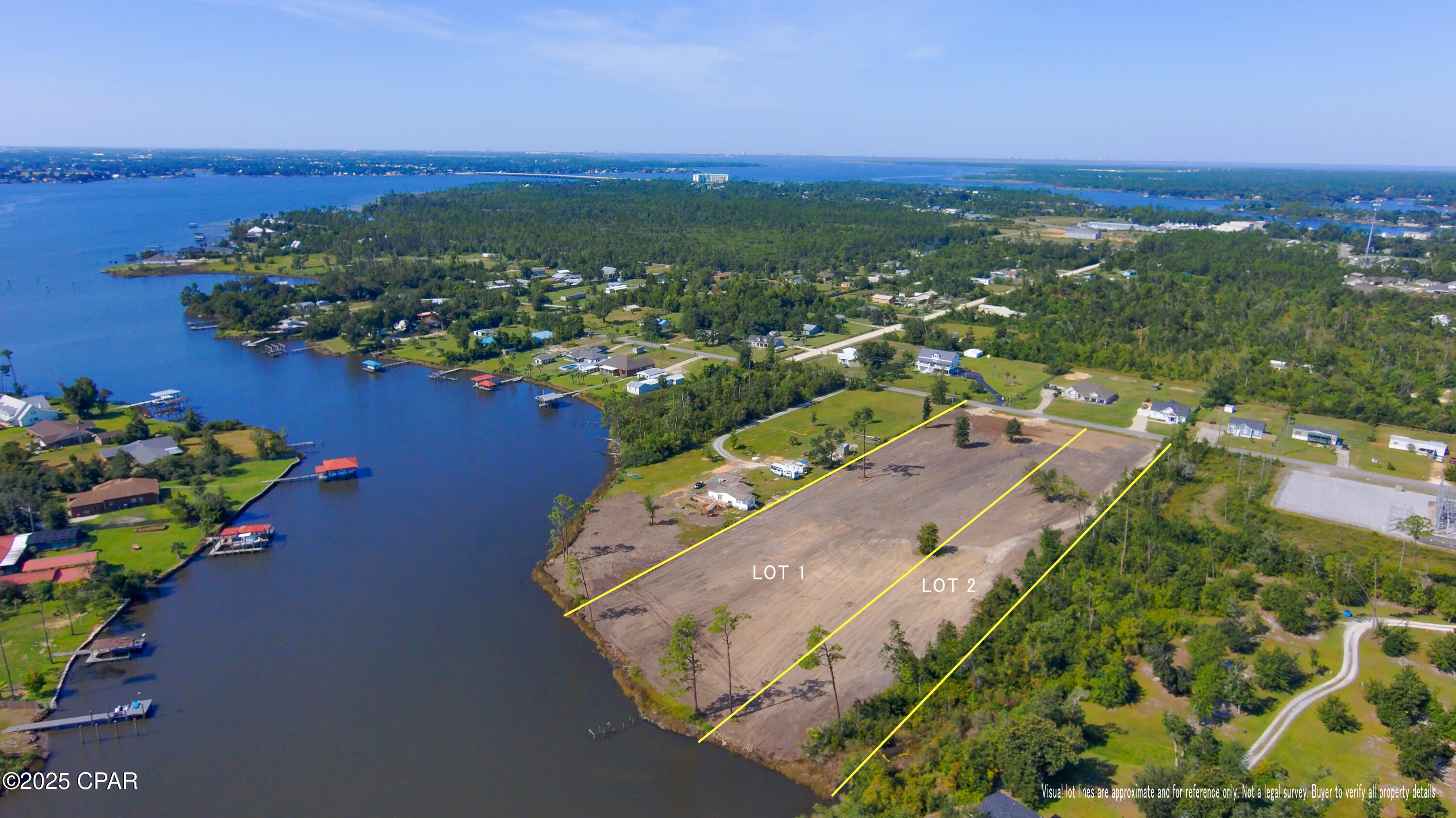 FAST-GROWING SOUTHPORT • CLEARED WATERFRONT ACREAGE • NO HOA • OPTION TO PURCHASE TWO PARCELS (5.13 ACRES TOTAL)

One of the best waterfront land values in Bay County's fastest-growing area almost fully cleared, no HOA, and ready for your vision. This Bay Crest offering includes a 3.58-acre waterfront parcel with the option to also purchase the adjacent 1.55-acre parcel, creating a rare 5.13-acre combined waterfront assemblage in an area where rare opportunities like this are getting harder to find.
The primary parcel features approximately 216 feet of waterfront along Gainer Bayou and offers boating access out to North Bay and beyond. When combined, the two parcels provide approximately 350 feet of total waterfront (per survey/legal descriptions) and significantly expanded flexibility for a private estate, multi-generational family compound, or a small boutique residential development.
The County has indicated residential build potential (buyer to verify final density, entitlements, and infrastructure requirements), and the property is zoned R-2 Residential, offering a range of residential-use options. You'll also appreciate the practical advantages: paved road access, nearby public utilities (water and electric available; septic required), and no HOA or deed restrictions holding you back. Bay Crest zoning can also allow design flexibility, including certain accessory structures such as a workshop, garage, or guest suite positioned in front of the main residence (buyer to verify intended site plan and permitting).

The location is a major driver of long-term value just minutes to Lynn Haven, with convenient access to Panama City, Northwest Florida Beaches International Airport, and Panama City Beach. Growth and new amenities nearby continue to make Southport a standout for buyers who want space, water, and upside.

If you've been waiting for cleared waterfront acreage with flexibility and a strong location this is a rare chance to buy one parcel or assemble both for maximum potential.
Note: Lot boundaries are approximate and for visualization only. Recent survey available. Buyer to verify all information deemed important, including zoning, density, utilities, waterfront measurements, and navigability/boat access.