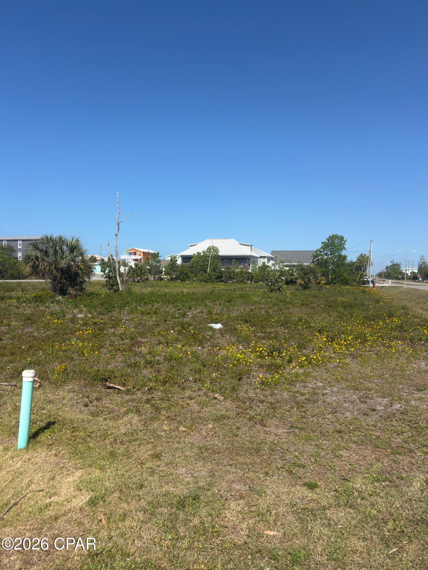 Oversized 75' x 150 corner lot with easy access to the dedicated and public beaches of Mexico Beach. Bring your building plans and vision as there is plenty of room for a pool and accessory space on this large homesite. This X FLOOD ZONE lot is only about 550' from the beach, where one can enjoy a short evening walk or golf cart ride and witness some of the most glorious westerly facing sunsets anywhere. Easy back access to your neighbors, parks, commercial spots, and other locations via the Florida Ave Boulevard. Competitively priced as the smaller corner lot across the street just sold for less per square for than this parcel is priced. New survey on file. Some information obtained via the Bay County Property Appraiser's website, please verify if important.