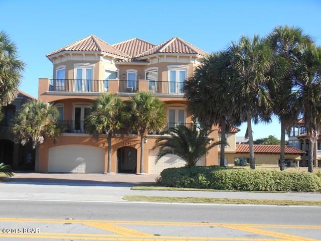 This well maintained 3 story 7BR/7.5BA, 4983 sq. ft. Mediterranean style home offers liberal interior living and entertaining space, magnificent views from several large balconies, elevator, outdoor grill, heated pool and hot tub, generous closet and storage areas, Travertine flooring, tile roof and the list goes on. Did I mention this property is located directly across the street from the most beautiful white sandy beaches and emerald blue water the Gulf of Mexico has to offer.  Plus on the North side the property there is 40' of waterfront on Lake Destiny. This Beautiful Vacation Rental property is being sold completely furnished. Considering the owner's heavy use this property has an excellent rental history. If important please verify all dimensions.  Shown by appointment only If important please verify all room dimensions and measurements. Shown by appointment only