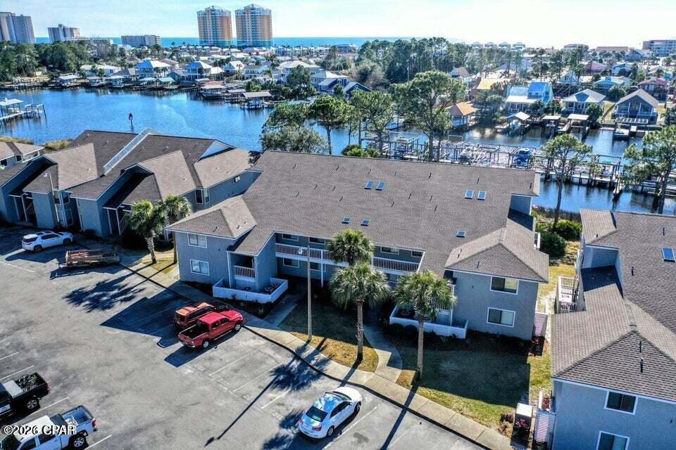 Fully Furnished Waterfront Condo for Long-Term Rent! Welcome to Point Lagoon Condominiums, Unit 209, ideally located on North Lagoon in Panama City Beach. This beautifully furnished 2-bedroom, 2-bath condo offers comfortable coastal living with access to the community pool and a convenient location near beaches, boating, dining, and shopping. Rent is $2,100 per month and includes water, basic cable, and trash service. Tenant is responsible for electricity. 12-month lease minimum. No pets permitted per the condominium association. Background check and security deposit required. Available now--schedule your showing today and start enjoying the waterfront lifestyle!