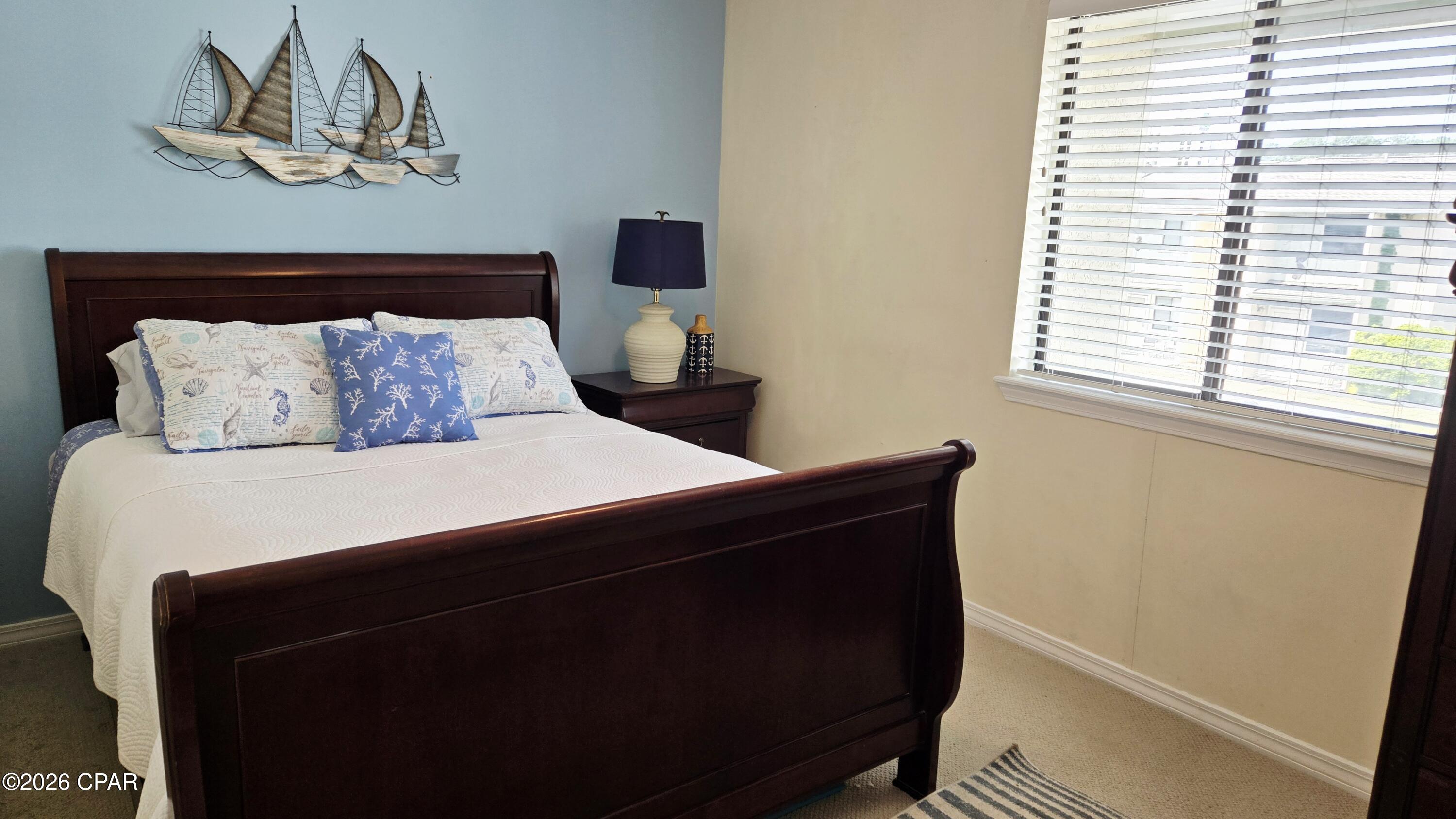 Adorable beach townhome at Gulf Highlands Beach Resort!  This stunning, updated townhome sits in one of Panama City Beach's most charming golf cart communities -- a true coastal gem. Freshly renovated and immaculately maintained, the home features new paint throughout, beautiful luxury vinyl plank flooring, and upgraded cabinetry paired with coordinating high-quality furniture. Cared for by its primary resident with no recent rental history, it's in pristine condition and offers effortless potential as a short-term vacation rental. Nestled in a prime location in the heart of Panama City Beach, you're just steps from multiple community pools and a pleasant stroll to the beach. The home is not in a flood zone and includes two reserved parking spots directly in front of the front door. Additional highlights include a spacious patio with included furniture, a recliner couch, a full-size washer and dryer, a natural gas stove, a 2024 water heater, and a 2018 roof. On-site amenities make everyday living feel like a perpetual vacation; one of the most amenity-rich communities in PCB featuring: • 11 pools (5 heated) • Private Gulf-front beach clubhouse with pool and snack bar • Tennis, pickleball, and shuffleboard courts • Mini golf, playground, and fitness center • Bicycle and golf cart rentals • On-site dining at The Beach House. Just minutes from grocery stores, shopping, and Panama City Beach's favorite local restaurants and attractions. This is far more than a typical beach condo -- it's a turnkey, low-maintenance coastal retreat with smart upgrades already completed. Perfect for both personal enjoyment and income potential. Easy to show -- don't miss this one!