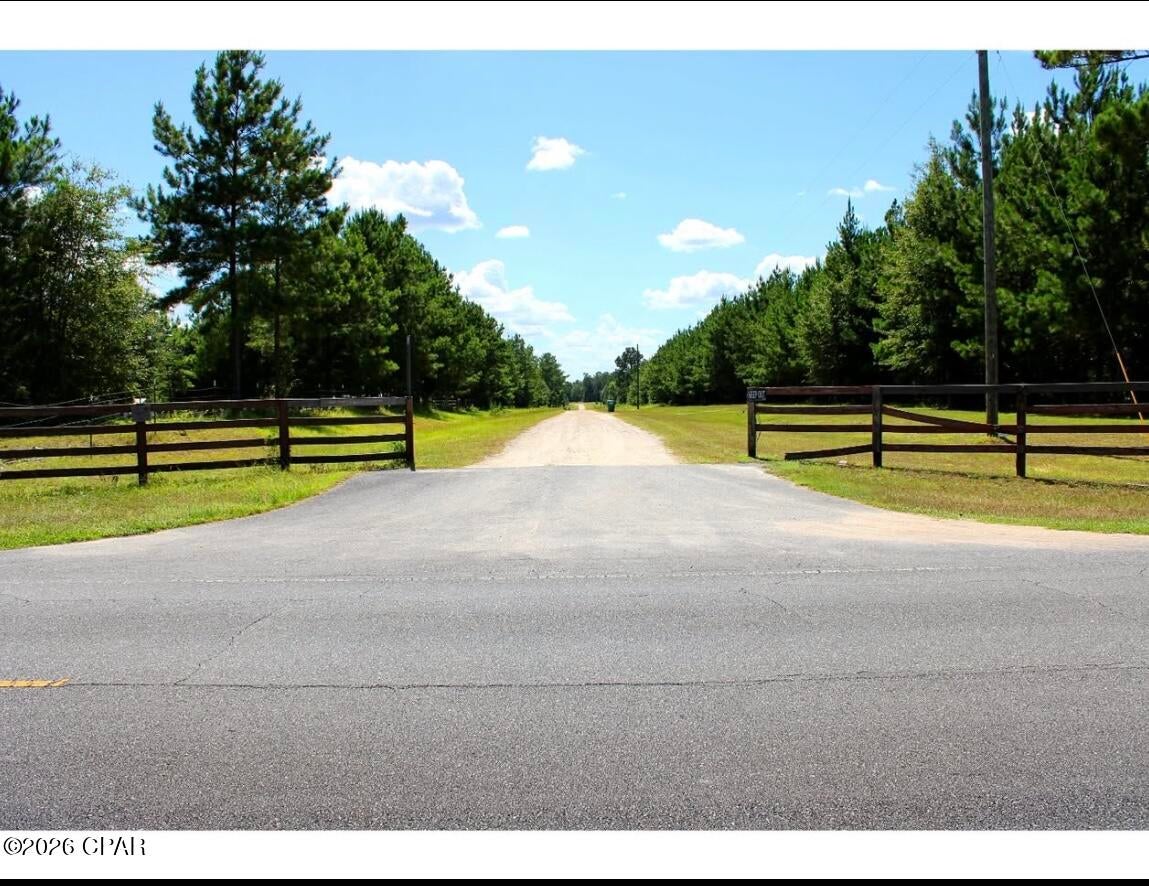 Discover the perfect opportunity to create your own private retreat on this beautiful 10+/- acre parcel in the desirable Reserve at Blue Springs community. Ideally located just minutes from Blue Springs Recreation Area, Florida Caverns State Park, and downtown Marianna, this property offers the best of both worlds--peaceful country living with convenient access to town, recreation, shopping, dining, and everyday amenities.

Much of the groundwork has already been completed to help bring your vision to life. The property features a newly cleared driveway and homesite, providing an excellent starting point for your future residence. A recent soil evaluation has been completed and approved for a conventional septic system, adding valuable peace of mind and simplifying the process of moving forward with your plans.

Surrounded by mature trees, abundant wildlife, and natural beauty, the property offers plenty of room to enjoy privacy and open space. Whether you envision a peaceful country homestead, a private family retreat, or a small-scale mini farm, this expansive parcel provides the space and setting to make it happen.