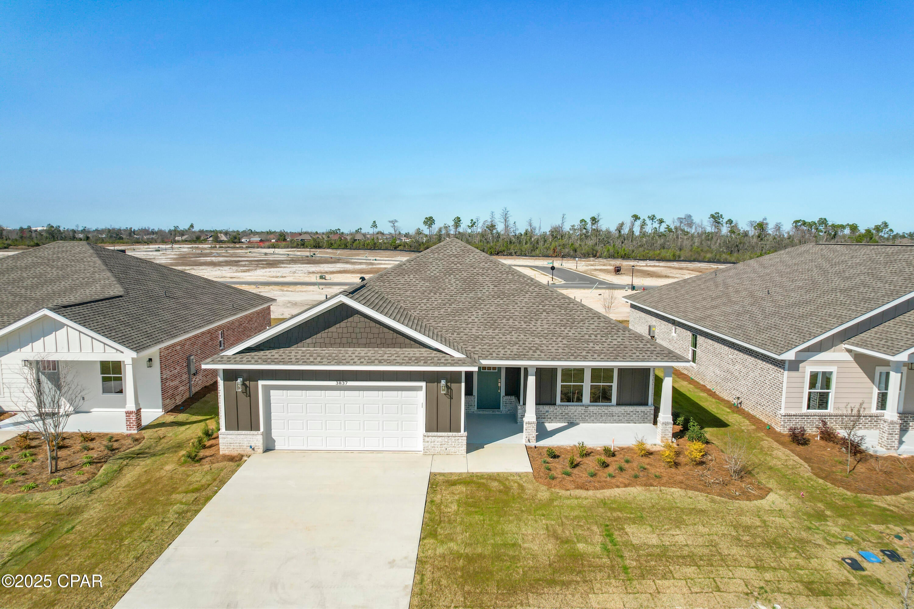 PRE-SALE TO BE BUILT - Wyoming Plan! Buyer can select design board finishes. Lot is located on desirable pond view!
Welcome to Game Farm! A peaceful, secluded community you'll be proud to call home. Nestled in a central location in Panama City, this charming neighborhood has been thoughtfully crafted by local homebuilder Southern Coastal Homes. From the moment you arrive, a beautifully landscaped grand entrance and scenic bridge welcome you into an inviting environment. This community features wide homesites, three-sided brick homes, preserved natural areas, tranquil ponds, three future parks, and a walking path for residents to enjoy. Inside this home, you'll find a wide range of high-quality upgrades including a tankless gas water heater, 9-foot ceilings, recessed lighting, painted Hardie-board siding on the front exterior, a gas kitchen range, a gas line ready for an outdoor grill, and a fully sodded yard with a sprinkler system. Tray ceilings enhance the living room and master bedroom, while the master bath includes double vanities, walk-in shower with glass door, a large walk-in closet, and convenient access to the laundry room. Additional features include a utility sink in the garage and a practical drop zone as you enter from the garage. This home is filled with beautiful finishes and thoughtful touches offering comfort, style, and everyday functionality. This home is TO BE BUILT! Buyer to verify any information deemed important.