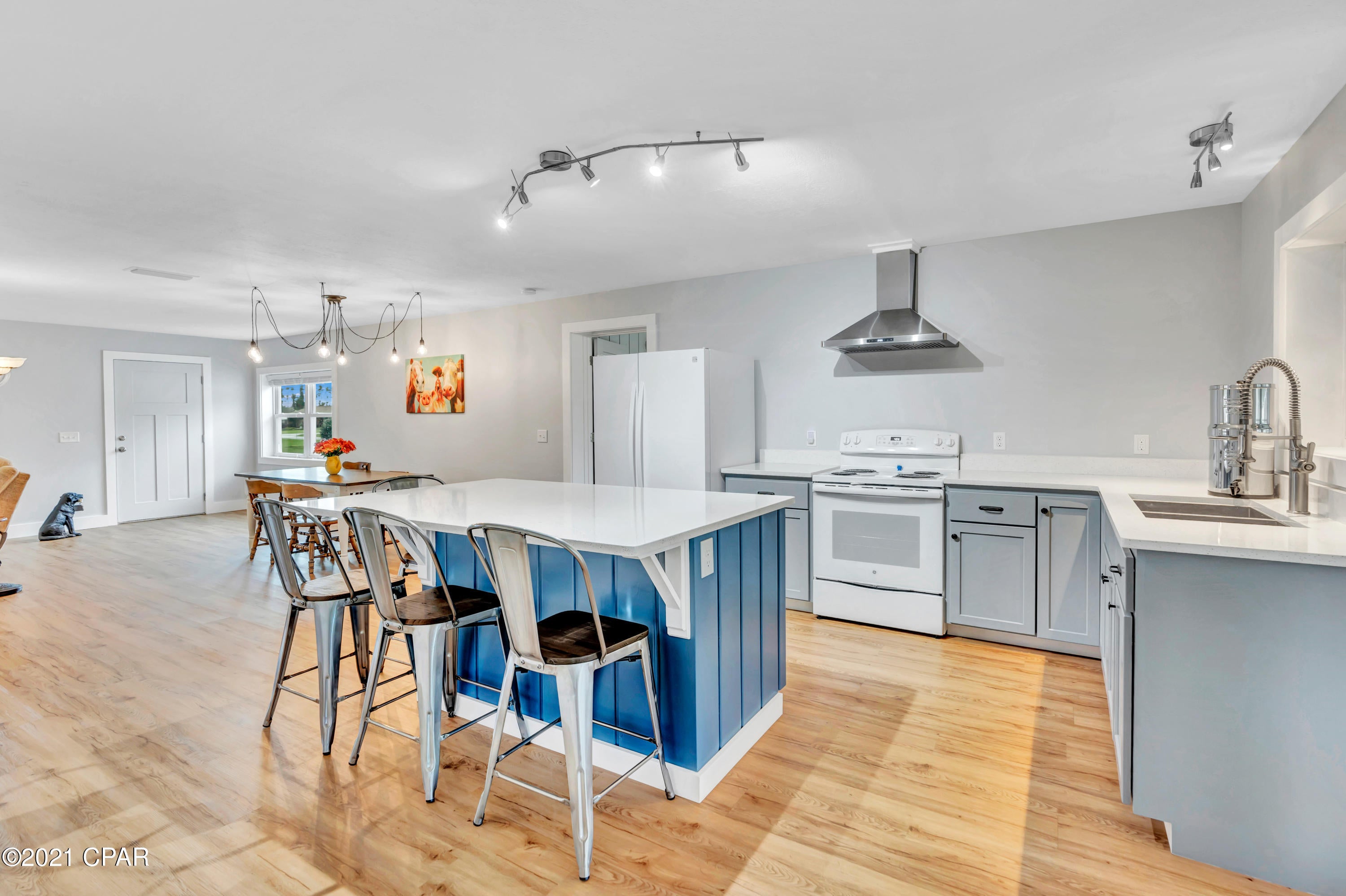 Completely RENOVATED home in the heart of HIland Park. This 3 bedroom, 2 bathroom with an office plus an enclosed back porch is a breath of fresh air! This energy efficient home has been rewired, new plumbing, new roof in 2017,insulated walls and spray foam under roof of house and sunroom, double hung energy efficient windows w full screens, ALL LED lighting, energy star rated appliances and stucco painted w elastomeric paint to seal house. Whole house water filtration and air purification. Solid wood cabinets throughout, as well as lifeproof flooring throughout the entire home. This home has an open floor plan with the living room, kitchen, dining area.  Master bathroom has double vanity, garden tub a separate shower. Open floor plan within the living room, kitchen and dining area. Seller is leaving the washer and dryer with new owners. This home WILL NOT last long! Call/text for your private showing today!