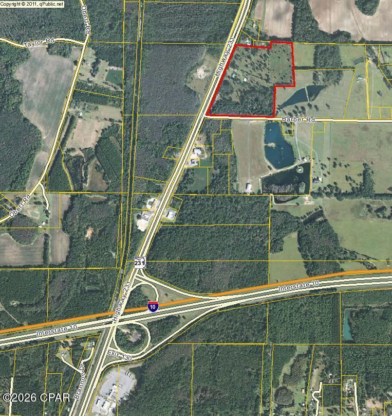 32.88+/- Acres just 1/4 mile North of I-10 on Hwy 231. I-10 has a traffic ct of 22,000 per day and Hwy 231 traffic ct of 12,000 and growing due to the NEW Bay County International Airport. 1350 Front Foot on Hwy 231 cornering with Barber Rd with 1181 front foot. Pump station located on SW corner and county water adjoins the property. Great location for a RV Park, Strip Center, Mall, Hotel, Golf Course, Ect.