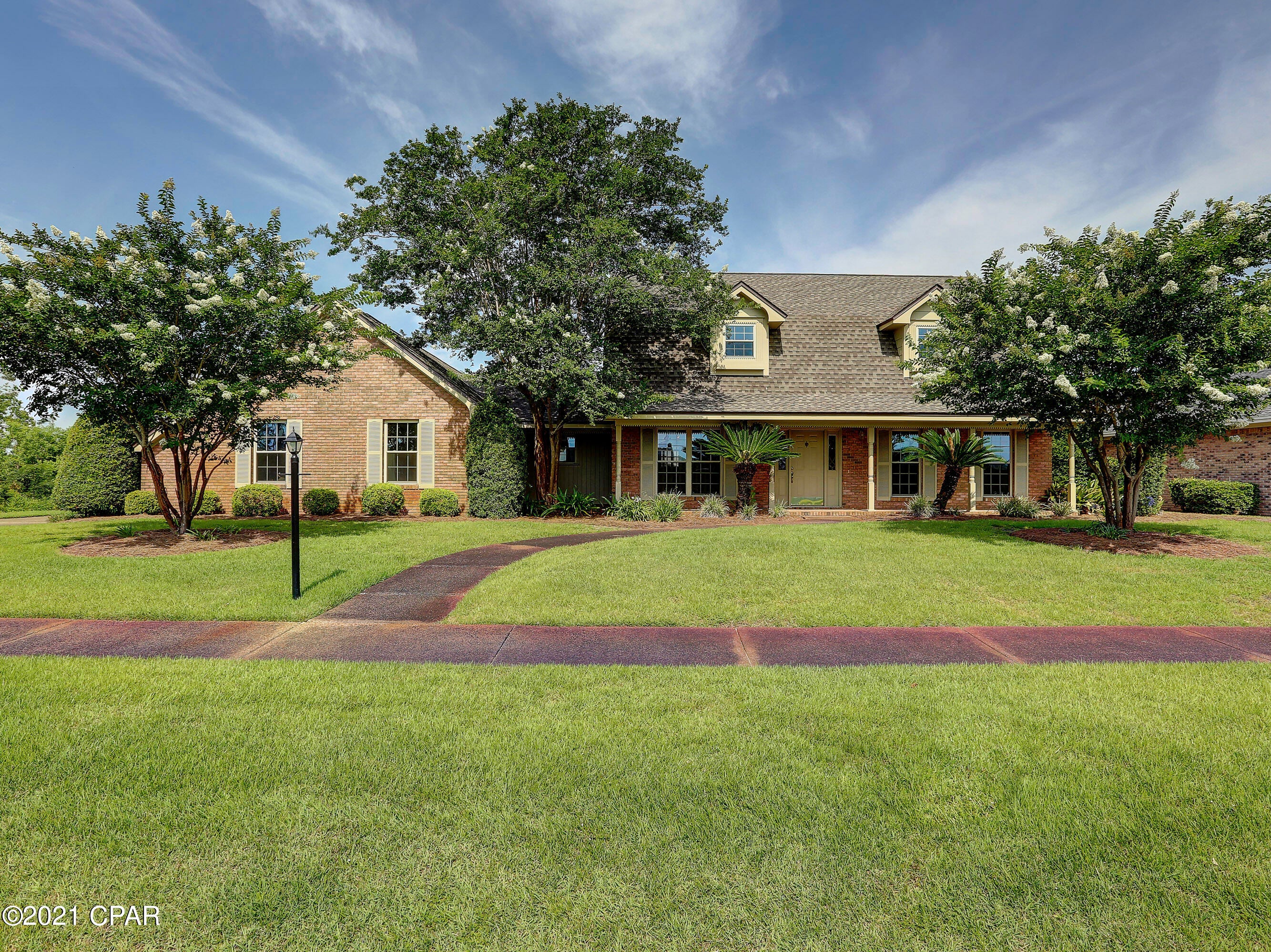 Take a look at this beautiful custom built, large, newly remodeled 4/3 home with large yard and many other amenities. This home has it all covered. There is a large formal dining and living room located in the front of the home, a remodeled kitchen with a large island, cooktop and beautiful cabinets with plenty of storage. The kitchen opens up in to a large great room with a beautiful fireplace and a large separate florida room attached. Downstairs also has a large laundry room, storage under stairs, a large bedroom and bathroom with large walk in shower. Upstairs is two large bedrooms with a large bathroom with double vanities and a shower and a large master with a master bathroom. The driveway is large and there is a detached garage. Large yard and plenty space for pool or a garden. The detached garage could be used for a multitude of things. There is a nice deck in the back for outdoor furniture and plants. This home is located just minutes away from Gulf Coast Hospital and 23rd street. It is centrally located to schools, shopping and restaurants.
