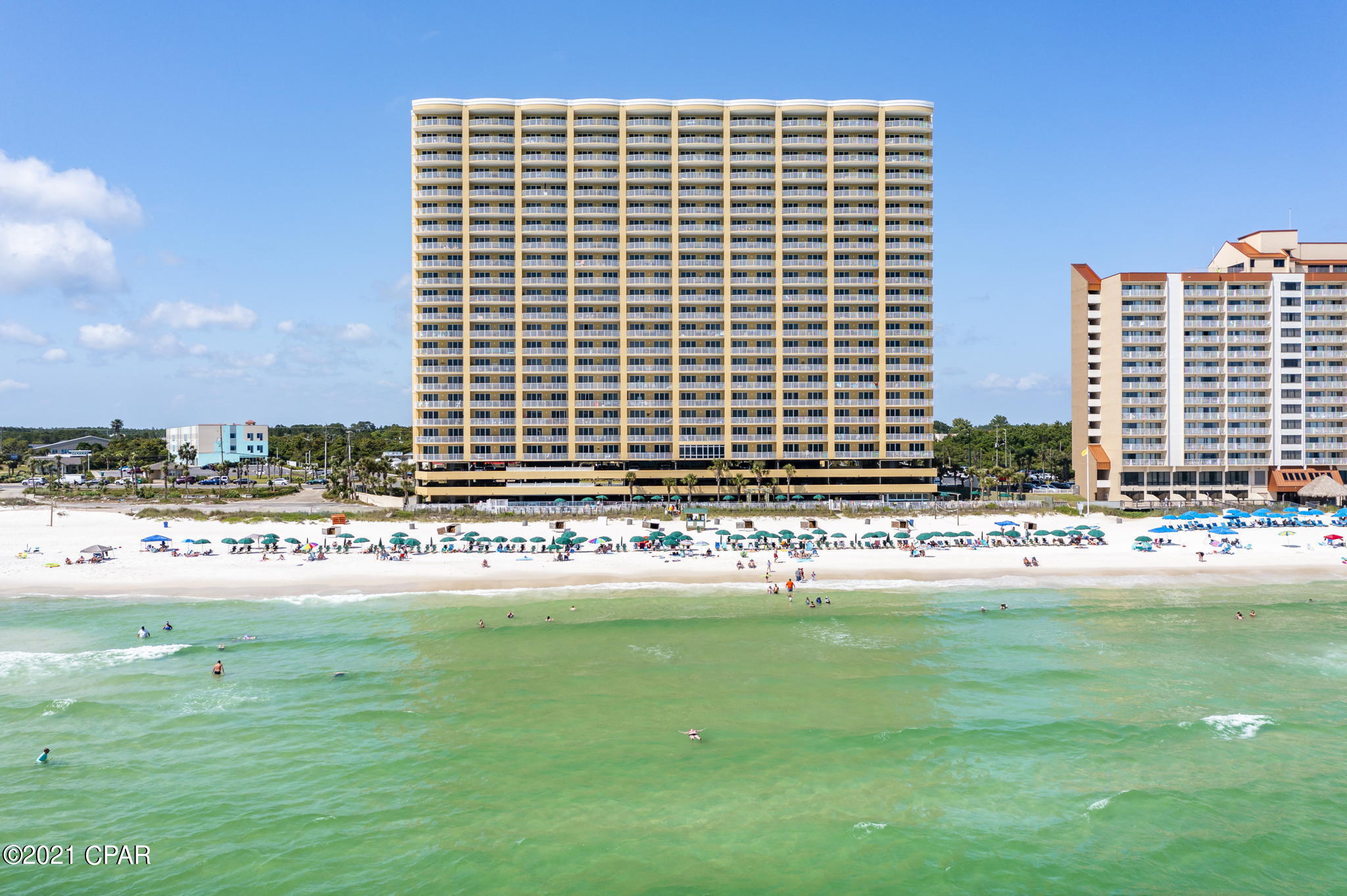 CURRENTLY UNDER CONTRACT, SELLER ACCEPTING BACKUP OFFERS. This never-rented coveted end unit condo with the most amazing wide-open balconies is ready for you.  Emerald Isle is located west of Pier Park 15 minutes away from the airport and has easy access to Rosemary Beach to the east.  People enjoy this building because it is in the more quiet part of the beach yet close to great shopping and restaurants.  There is a great swimming pool, tennis courts and fitness center and these units boast ample living spaces with panoramic views.
