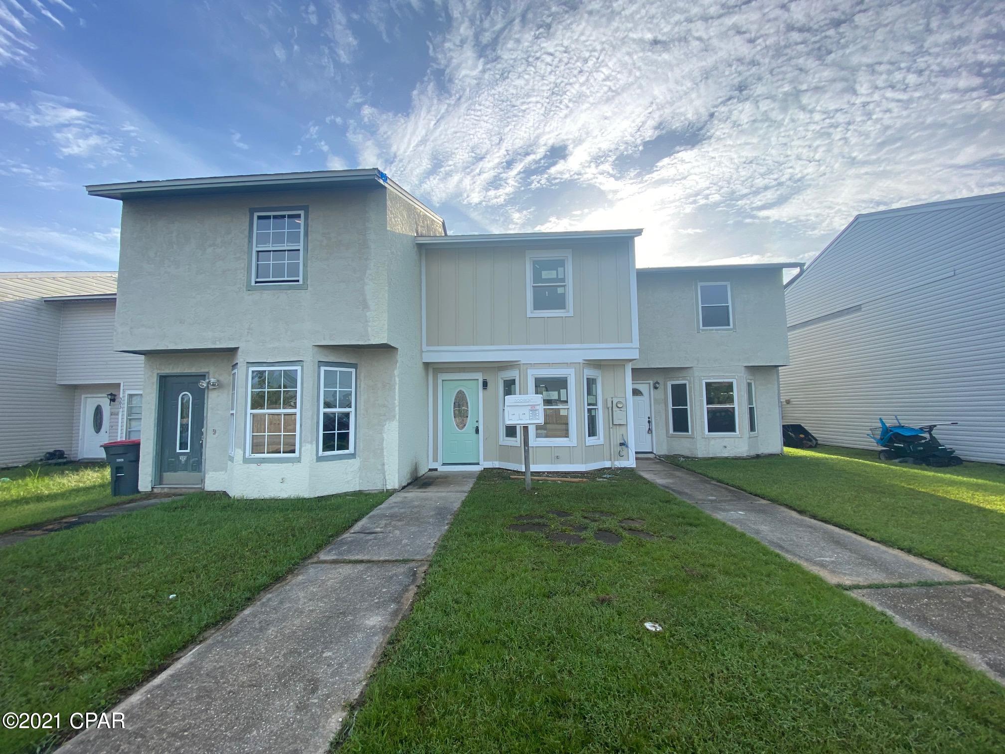 Great fix and flip with rental potential!!! This townhome is an end unit with a huge back yard, a back yard storage room and a washer dryer hook up in the unit. 2 large bedrooms and a full bathroom upstages half bath down stares with a shotgun style living room and kitchen space. This unit has some new windows, new roof, new doors and most of the sheet rock is done! This unit has NO HOA fees and your lender wont require flood insurance!