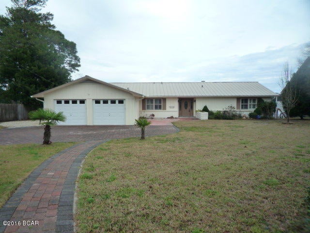 **Bank Owned**  Well maintained Waterfront home on Callaway Bayou just off East Bay with  Gulf access. Water views from nearly every room. Exterior features include Gated Entrance, Custom Paver Driveway, A 76' Dock in with Boat Lift and Jet Ski Lift, water and electric access on the dock. The beautiful interior boasts many kitchen upgrades; Beamed Ceilings, Fireplace and Built-ins in Living Room; Enclosed Water-Front Sun room with a wall of Windows.  3 Bedrooms, 3 Baths; Large Bonus room with a kitchenette....Perfect for Mother-in-law suite or Office.  Seller is offering 3.5% interest on a 5/1 ARM, 11% Down Payment, and No PMI with approved application.