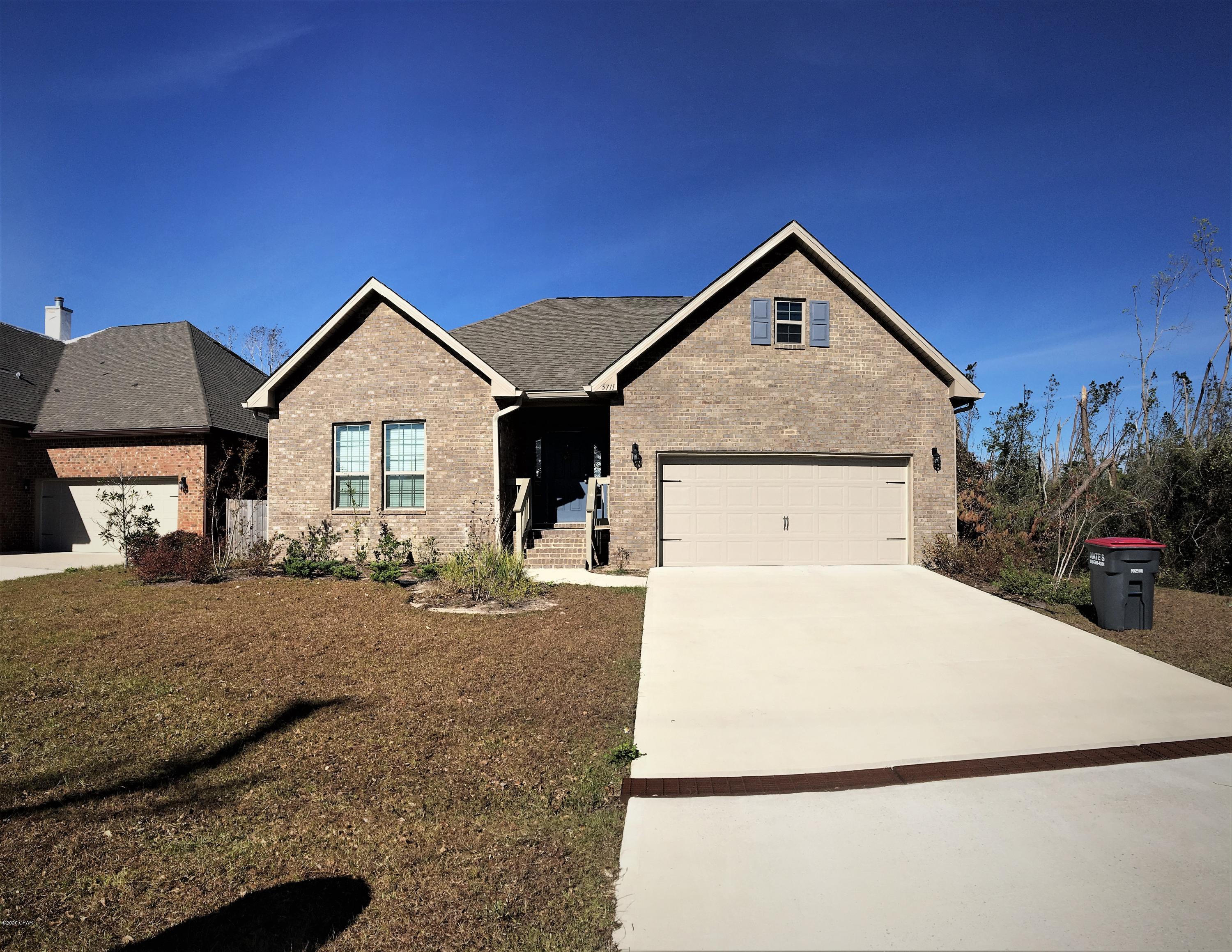 For rent! Gorgeous 3 br, 2 bath home in highly sought-after Cherokee Heights neighborhood. Close to local schools and a quick drive to Tyndall Air Force Base, this home is perfect for those seeking convenience in a residential community with  generous sized lots. You'll want to call this community home. The Graham has an open concept of the kitchen, family room, and dining area made for families and you have a large kitchen island and granite counters. Features include wood and tile flooring, beautiful tray ceilings in the foyer, family room, and master suite, with 9' ceilings in all other areas of the home. Close enough to the schools that the kids can walk home! **Pets negotiable upon approval with non-refundable $250 pet fee.