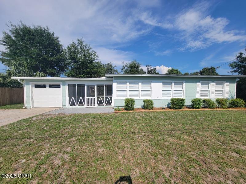 Welcome to this charming Florida cottage located in the desirable Cove District of Panama City! This beautifully refreshed home offers 3 bedrooms, 1 bathroom, and a single-car garage.

Inside, you'll find fresh interior paint, durable luxury vinyl plank flooring throughout, and a fully equipped kitchen with brand-new appliances. A full-size washer and dryer with a steam-clean feature are also included for your convenience. All the ceiling fans have remotes

Relax and unwind on the spacious screened porch, perfect for enjoying peaceful mornings or quiet evenings. The fully fenced backyard provides plenty of space for outdoor activities, and entertaining.

Ideally located just minutes from Historic Downtown Panama City, you'll have easy access to local shops, restaurants, waterfront attractions, and community events.

Small pets under 24 pounds are welcome with owner approval. Pet fees apply. Application required. Call to schedule a tour.
