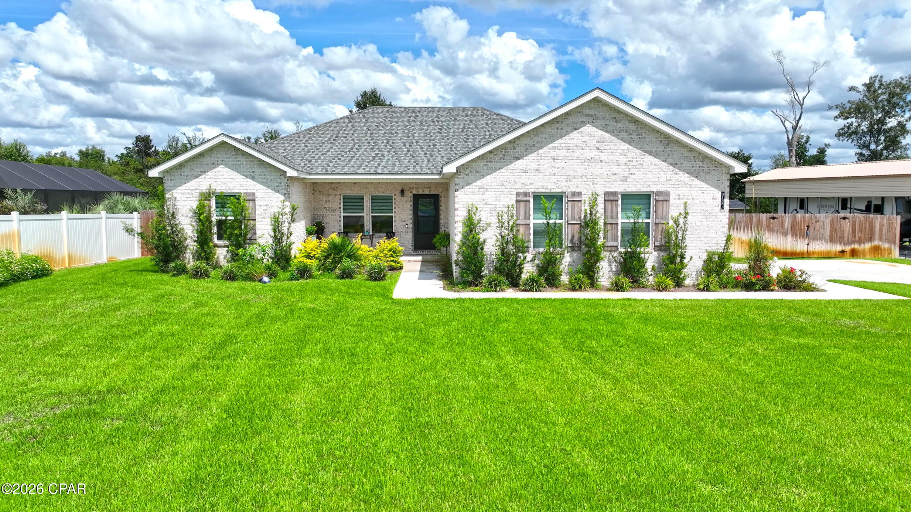 What a beautiful home! The home was rebuilt after tornado damage in 2025. The curb appeal is awesome. The washed brick finish and immaculate landscaped yard make for a very attractive first impression. The lot is over a half-acre & waterfront to include a dock allowing for boating access to Deer Point Lake. Across from the dock is a non-developed property leaving you plenty of privacy. The inside of the home is covered in beautiful oak like waterproof luxury vinyl flooring throughout. All the walls finished in light white finishings keeping the home bright and easy on the eyes. The color and design choice of the matching Granite Counter tops in the kitchen, bathrooms and pantry are the perfect blend between the colors of the floors and walls.  The entire home is equipped with a complete water softening system This home is a true pleasure to view. The rooms are spacious and the 4th room offers an office or additional bedroom given the new owners need. The home was built by Guyson Construction. He is rapidly becoming known as one of the premier builders in our area with his excellent designs and quality of construction. Outside in the well-manicured grounds the home sits up high and dry as the home being rebuilt in 2025 raises the home out of any previous flood areas. Of course, we all enjoy the pleasure of an outside shower after a hard day's work in the yard. All these quality characteristics and it's priced right, too! If you are in the market for a new home, we encourage you to view this beautiful house today.