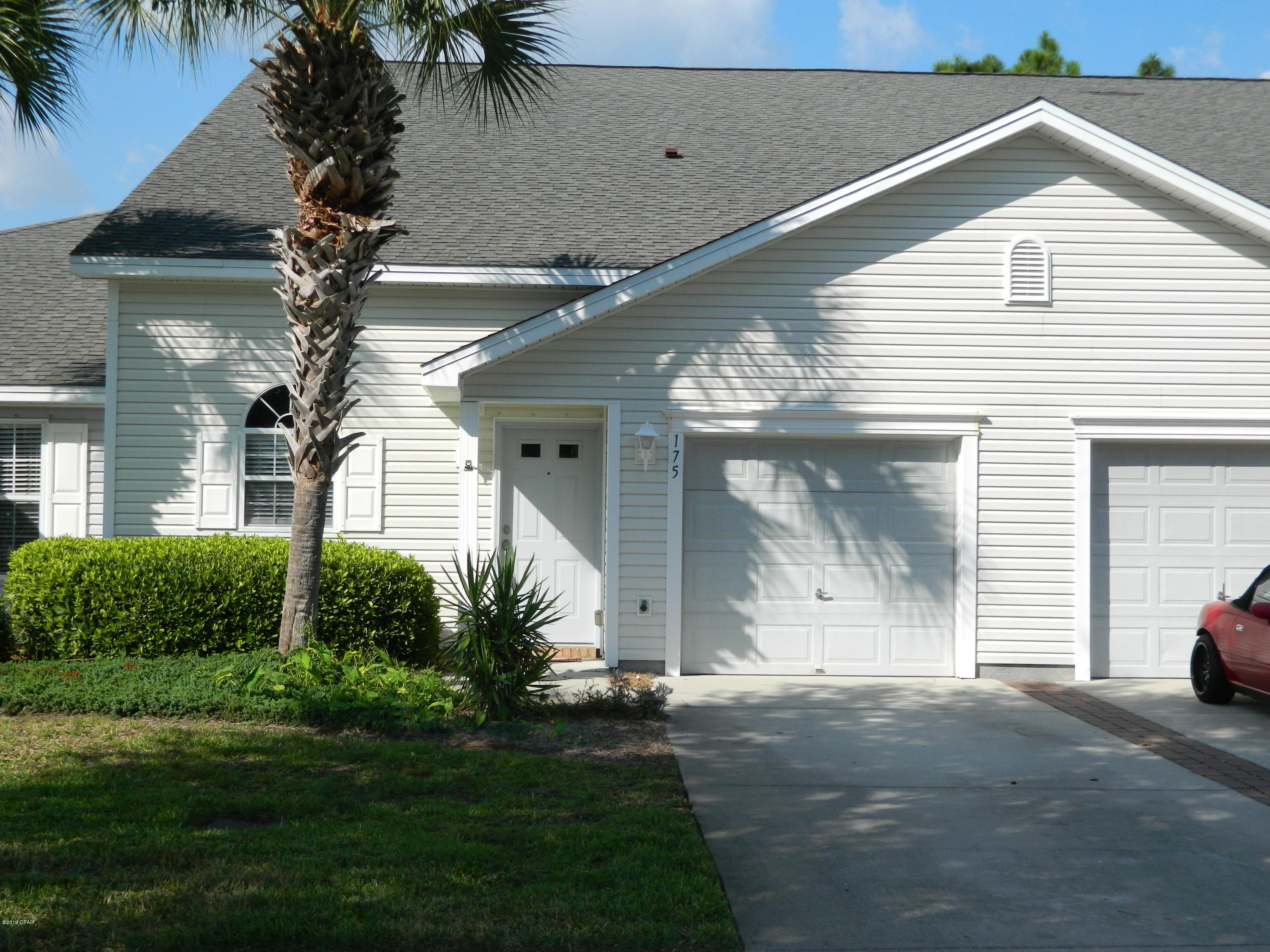 For Rent. This two story town home is located in the desirable community of Palmetto Trace. This neighborhood features two community pools, sidewalks throughout, and is across the street from Pier Park. The living area offers spacious under closet storage and access to the patio and the open backyard. The master suite is located on the first floor and features his and her walk in closets and an adjoining private bathroom. The bonus loft upstairs offers additional living space and would make the perfect area for a home office or playroom. Also upstairs are two nice size bedrooms and a full bathroom. Full size washer/dryer included. Rent includes lawns service. No pets. Available for immediate occupancy.