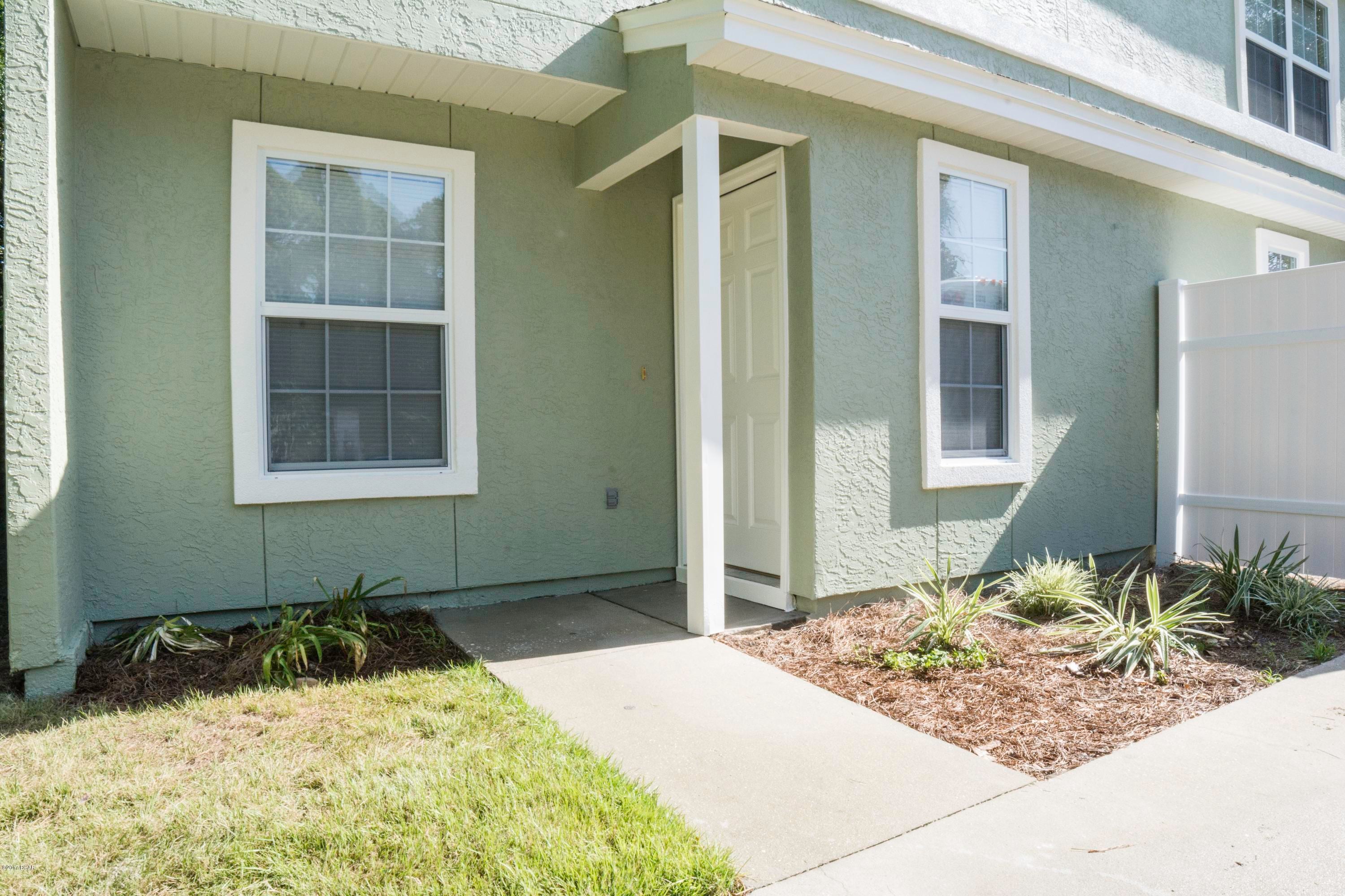 Two Bedroom Two Bath Townhome style duplex. Freshly painted with new carpet and LED lights throughout. Tile in the living room, dining room, kitchen and both bathrooms. Carpet on the stairs and both bedrooms. Washer and dryer hooks ups upstairs. Large partially fenced shared back yard. One year lease and $1095 security deposit required as well as a credit check (minimum 600 credit score) One dog with breed restrictions will be considered on a case by case bases with a non-refundable $250 pet deposit and an increase of $25 in monthly rent. No cats.