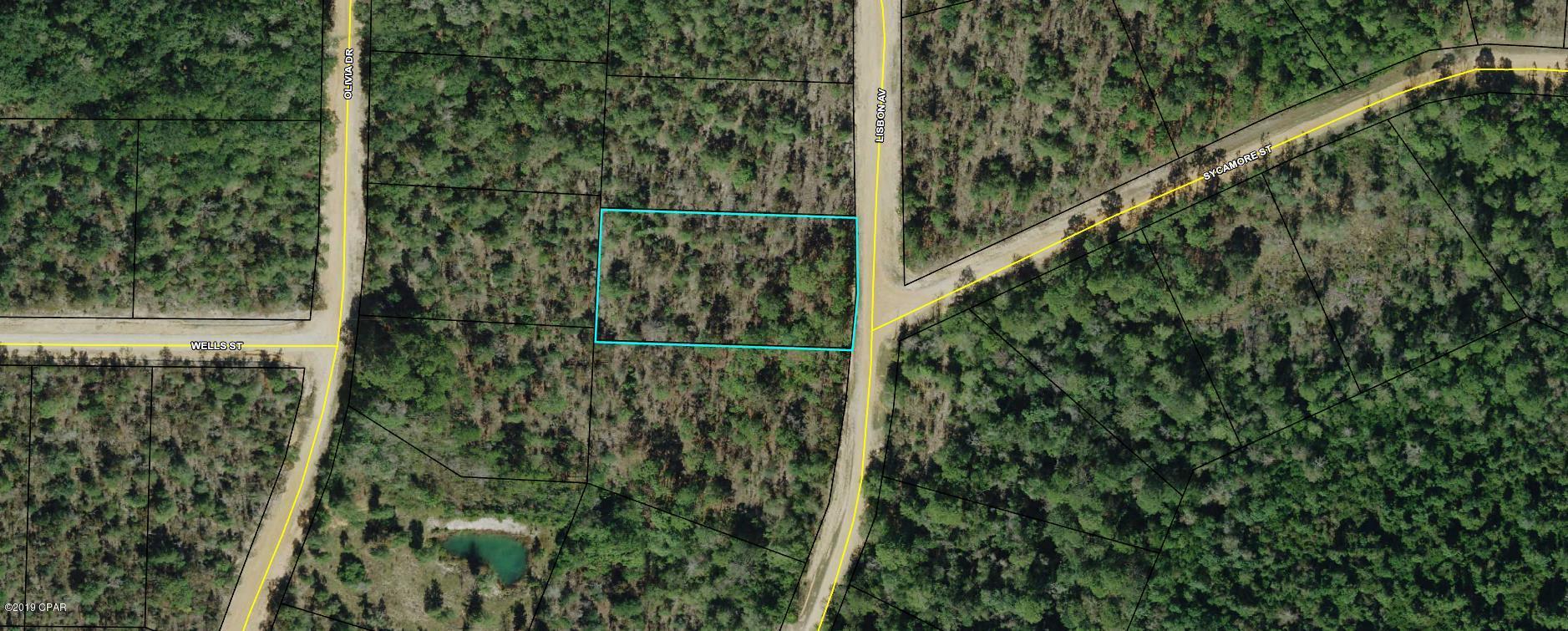 BEAUTIFUL VACANT LOT IN COMPASS LAKE IN THE HILLS, PERFECT FOR BUILDING YOUR DREAM HOME WITH LOTS OF PRIVACY. THERE'S FOUR VACANT LOTS IN TOTAL THAT CAN BE PURCHASED TOGETHER OR SEPARATELY.