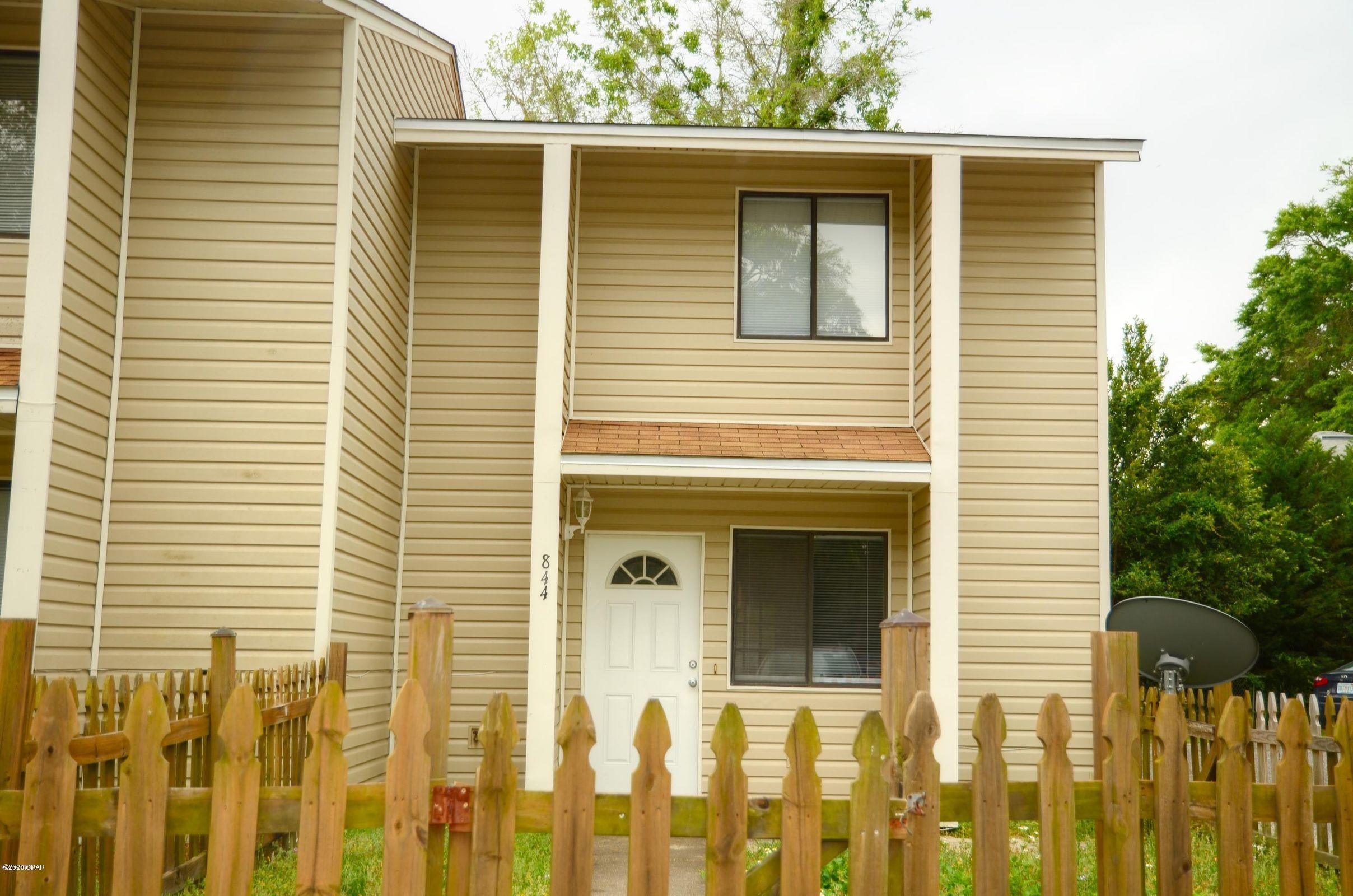 Great town house thst is convenient and a relaxing locastion. Two bedrooms upstairs with a open living room - dining area floor plan. Seperate laundry room that leads to a small patio out back.  Plus the back is fenced in for privacy.