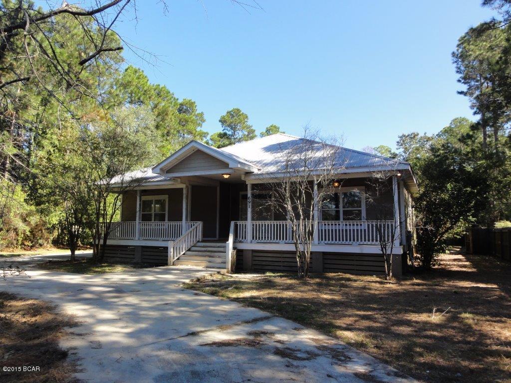 Great opportunity for an investor! Rocking chair front porch! Fireside family room with vaulted ceilings! Master bedroom with private bathroom! Spacious secondary bedrooms share a full bathroom! Kitchen features stained cabinets, breakfast area, breakfast bar, and granite countertops! Screened porch and deck overlooks backyard! Please show and submit your offer today!