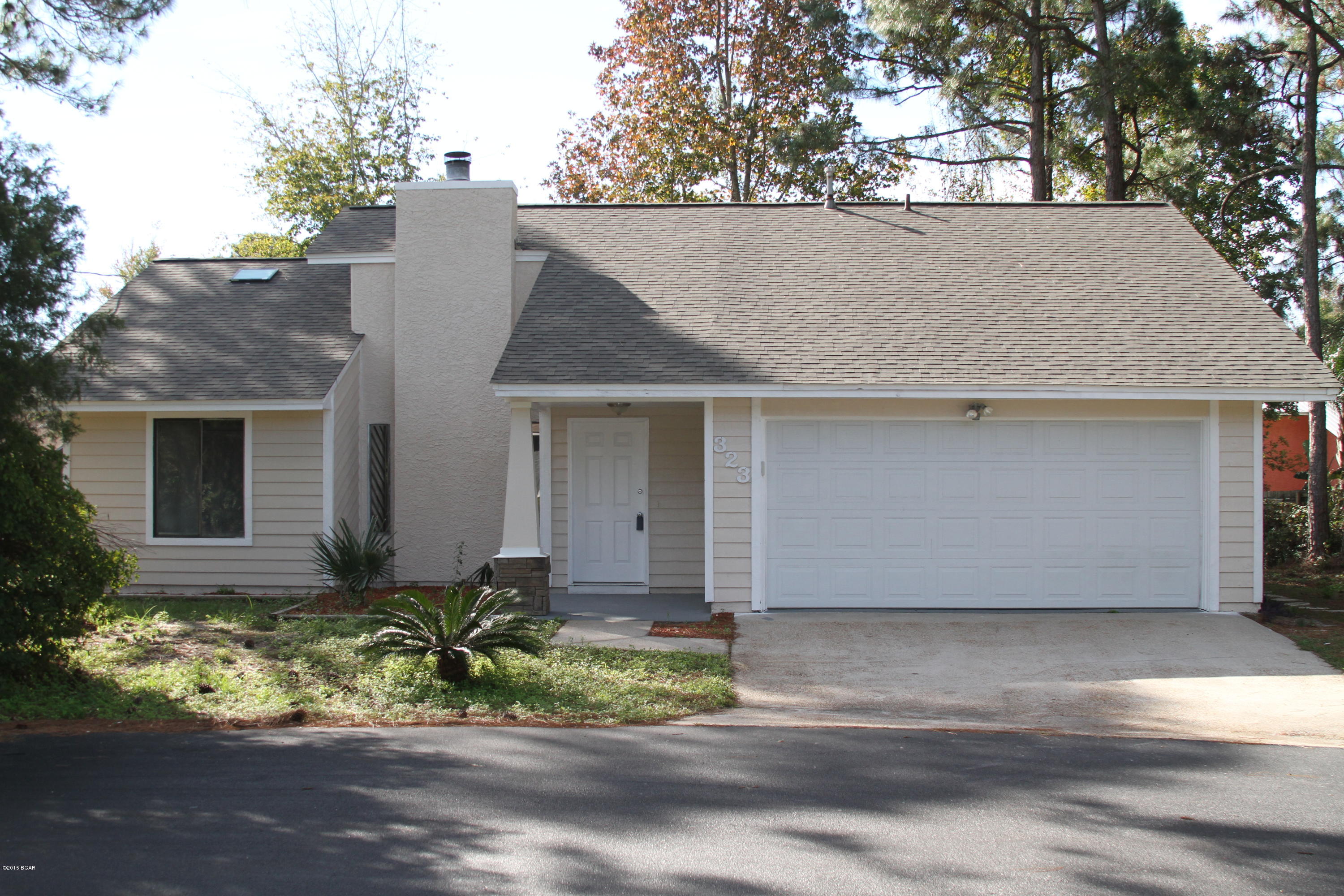 You're gonna LOVE this home! Sits at the end of the cul-de-sac!  Brand New Architectural Roof Installed in Nov 2015! Brand New Stainless Kitchen appliances (Fridge, DW, Stove). Brand New Flooring throughout.  Freshly Painted inside and out!  Updated Bathrooms! MOVE-IN Ready!!! Need we say more?  Of course we should...  Seller has spent over $30,000 in renovations! A  HUGE almost ½ acre lot, with mature trees and shrubs, off the desireable North of Grand Lagoon area.  Close to the beaches and St. Andrews State Park. Close to the marinas off Thomas Dr. Close to Naval base. Close to shopping and great restaurants.  AND there's a great walking path along North Lagoon that the community enjoys - you'll see people walking pets, riding bikes and jogging all the time! This is a great neighborhood The kitchen is Brightly lit ALL the time due to the beautiful skylights and big bay windows.  Double doors go to the large covered patio and backyard!  Also - this home is located at the end of the cul-de-sac, privacy and space galore.  Don't wait!  Call your favorite realtor today to see this home!