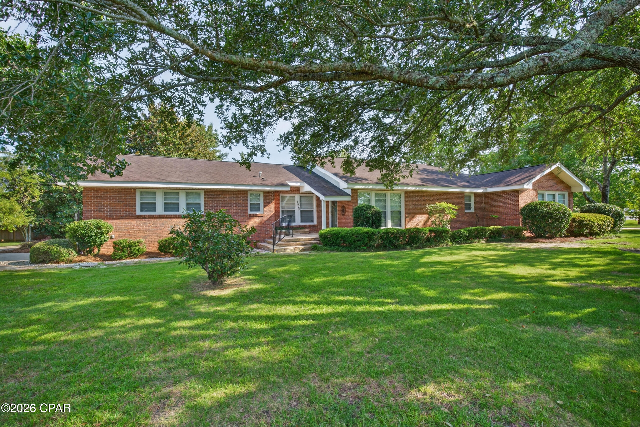 Welcome to 1309 South Boulevard! This spacious 3-bedroom, 2-bathroom home offers 2,133 square feet of living space with plenty of room to spread out. The living area flows into a sunporch, providing additional space to relax and enjoy the natural light. The kitchen offers an abundance of cabinet space for storage, while the laundry room has plenty of room for a freezer. The master bathroom features a handicap-accessible shower for added convenience. Original hardwood floors are tucked beneath the carpet, offering the potential to restore the home's classic charm. Additional storage can be found in the walkable attic, providing plenty of space for seasonal items and more. With its generous square footage, practical layout, and additional storage, this home offers plenty of possibilities for its next owner!